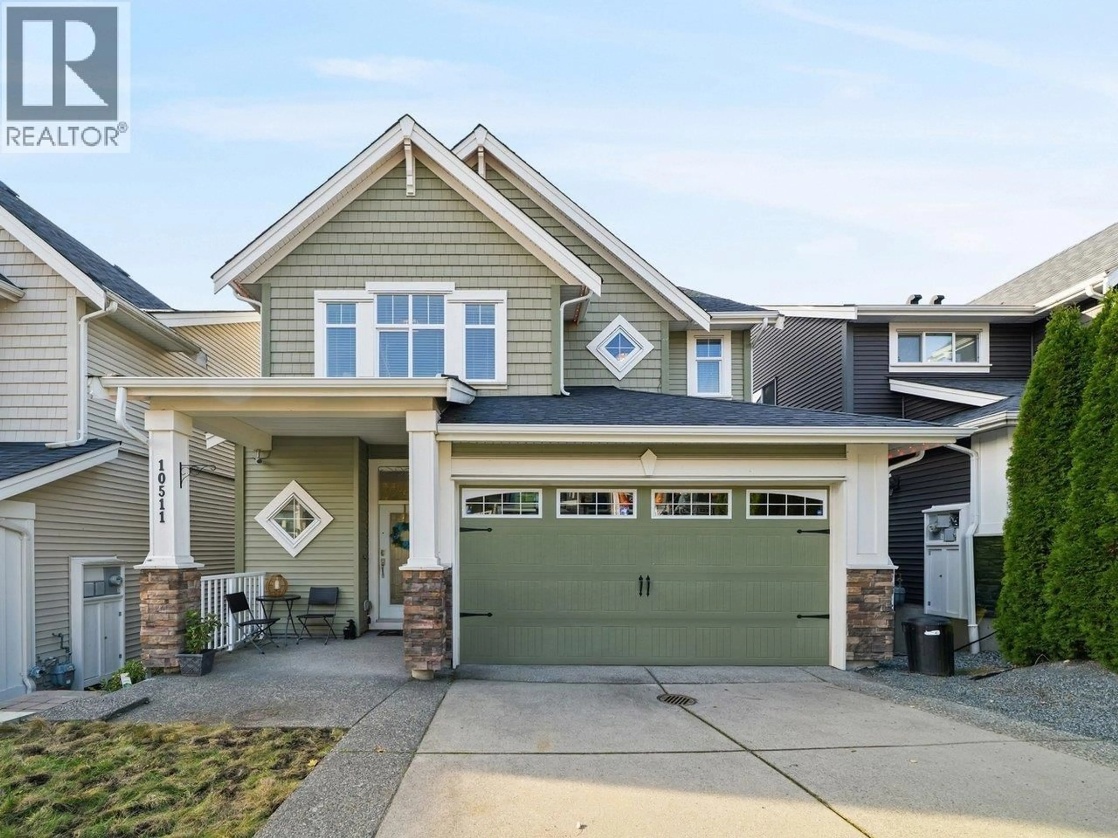 Home with vinyl exterior material, street for 10511 MCEACHERN STREET, Maple Ridge British Columbia V2W0H8