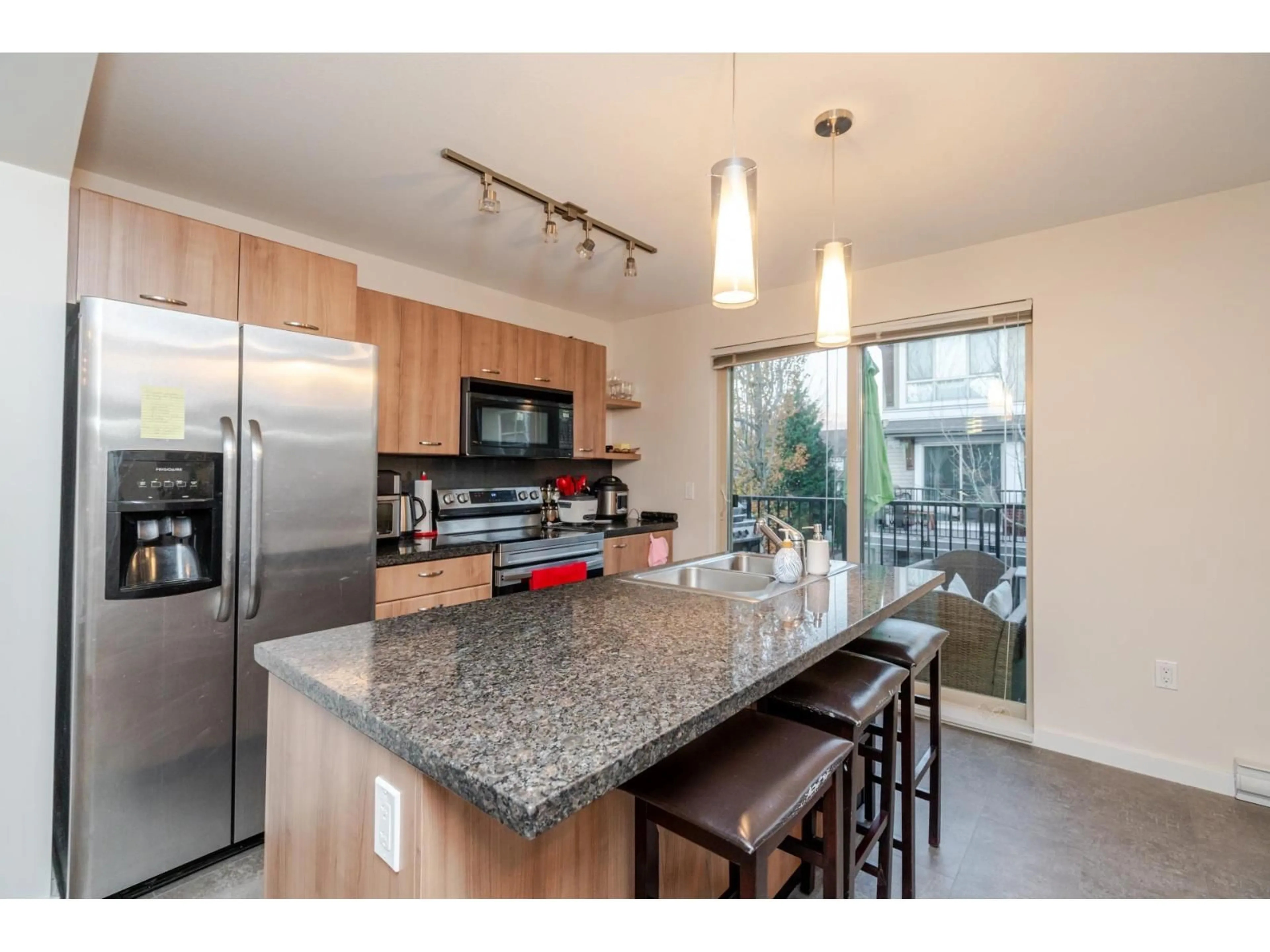 Open concept kitchen, unknown for 110 - 6671 121, Surrey British Columbia V3W1T9