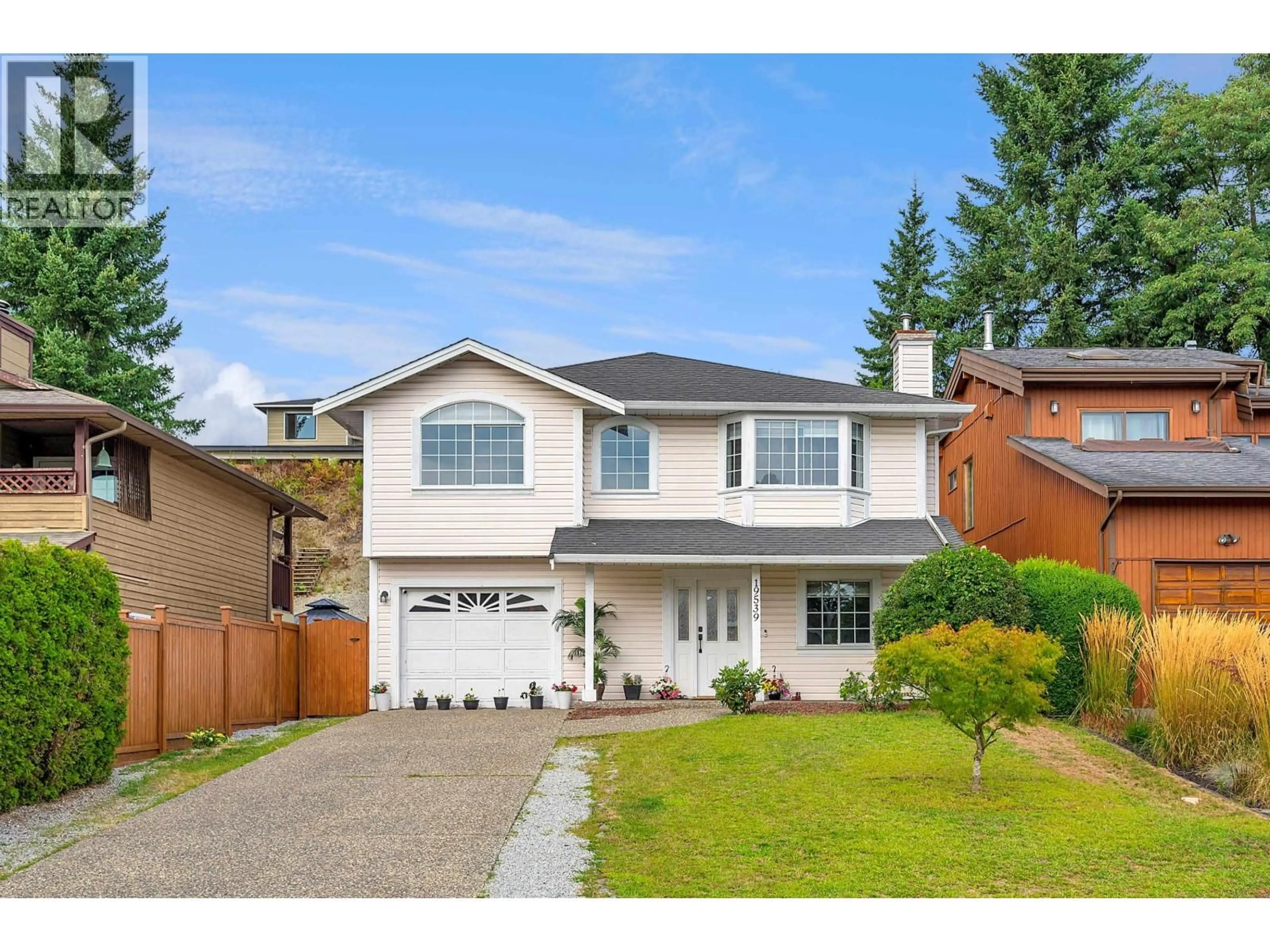 Home with vinyl exterior material, street for 19539 115A AVENUE, Pitt Meadows British Columbia V3Y1R2