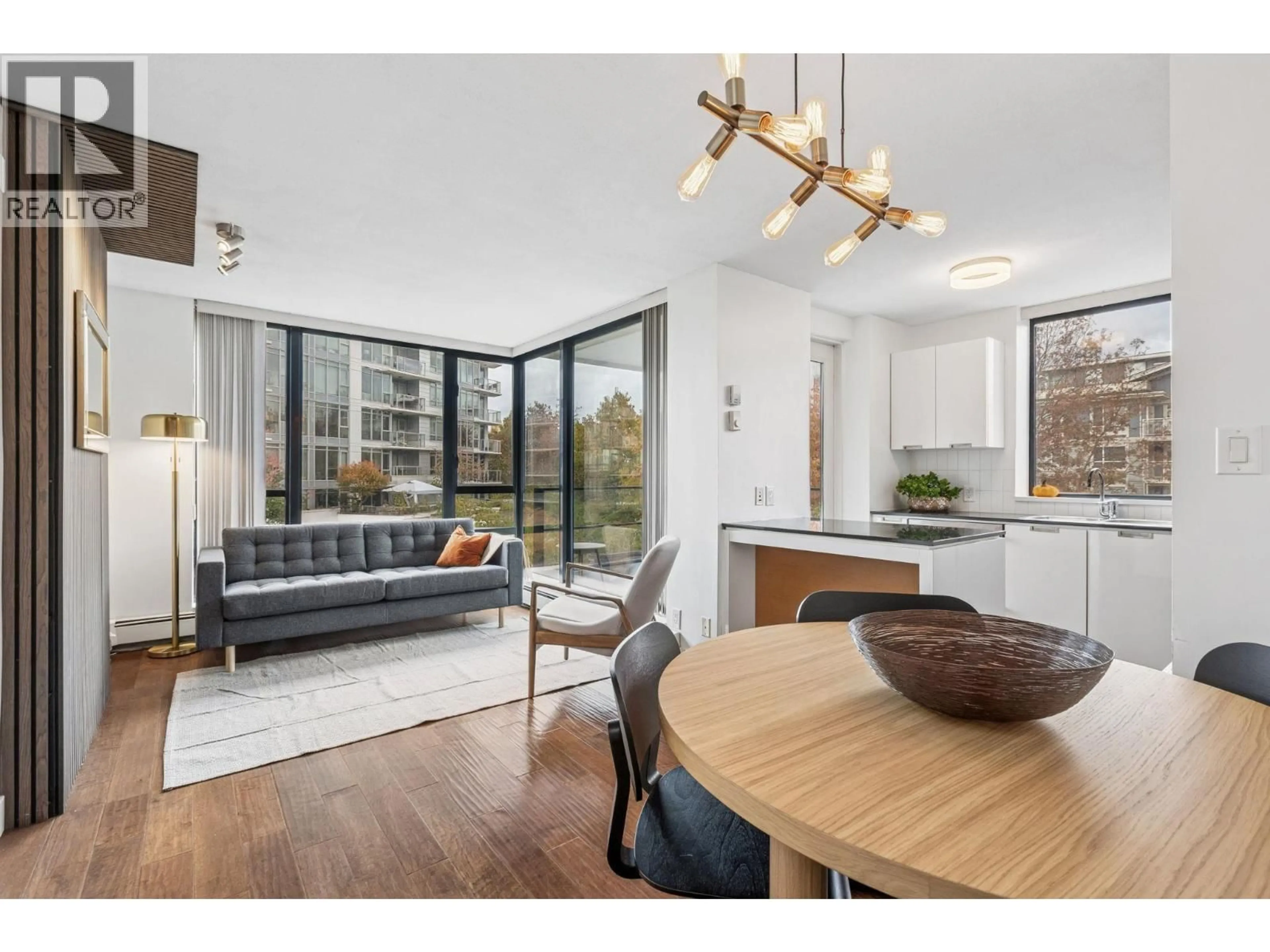 Open concept kitchen, wood/laminate floor for 605 - 151 2ND STREET, North Vancouver British Columbia V7M3P1