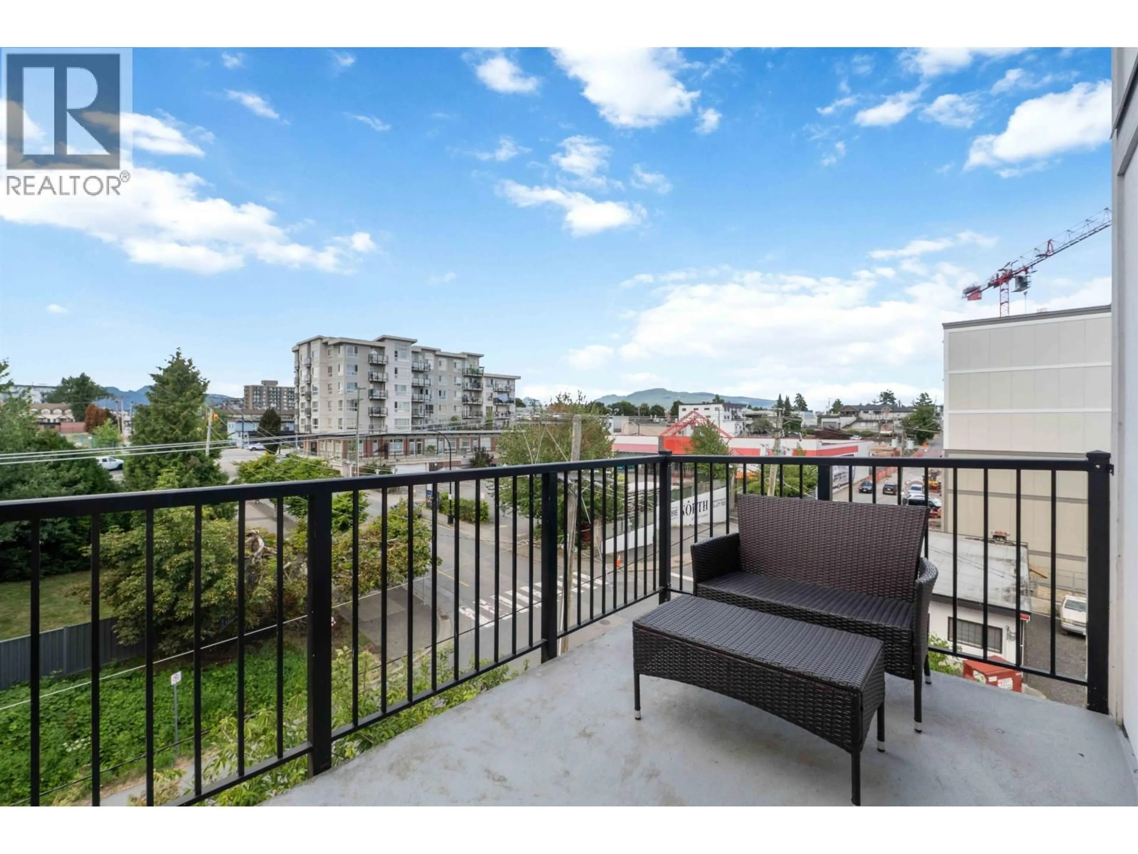 Balcony in the apartment, city buildings view from balcony for 404 - 22290 NORTH AVENUE, Maple Ridge British Columbia V2X8Z8