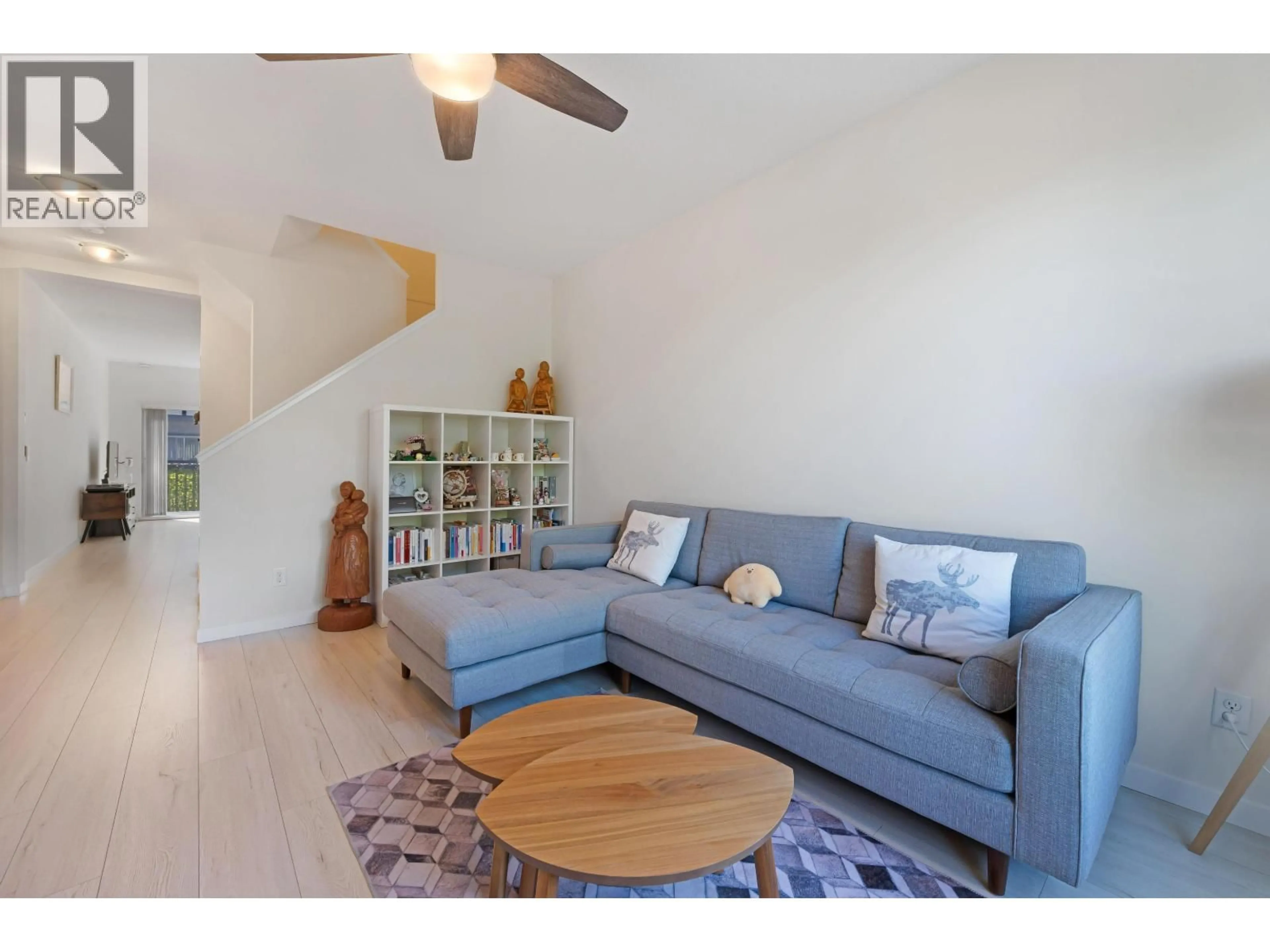 Living room with furniture, wood/laminate floor for 75 - 9566 TOMICKI AVENUE, Richmond British Columbia V6X0E6