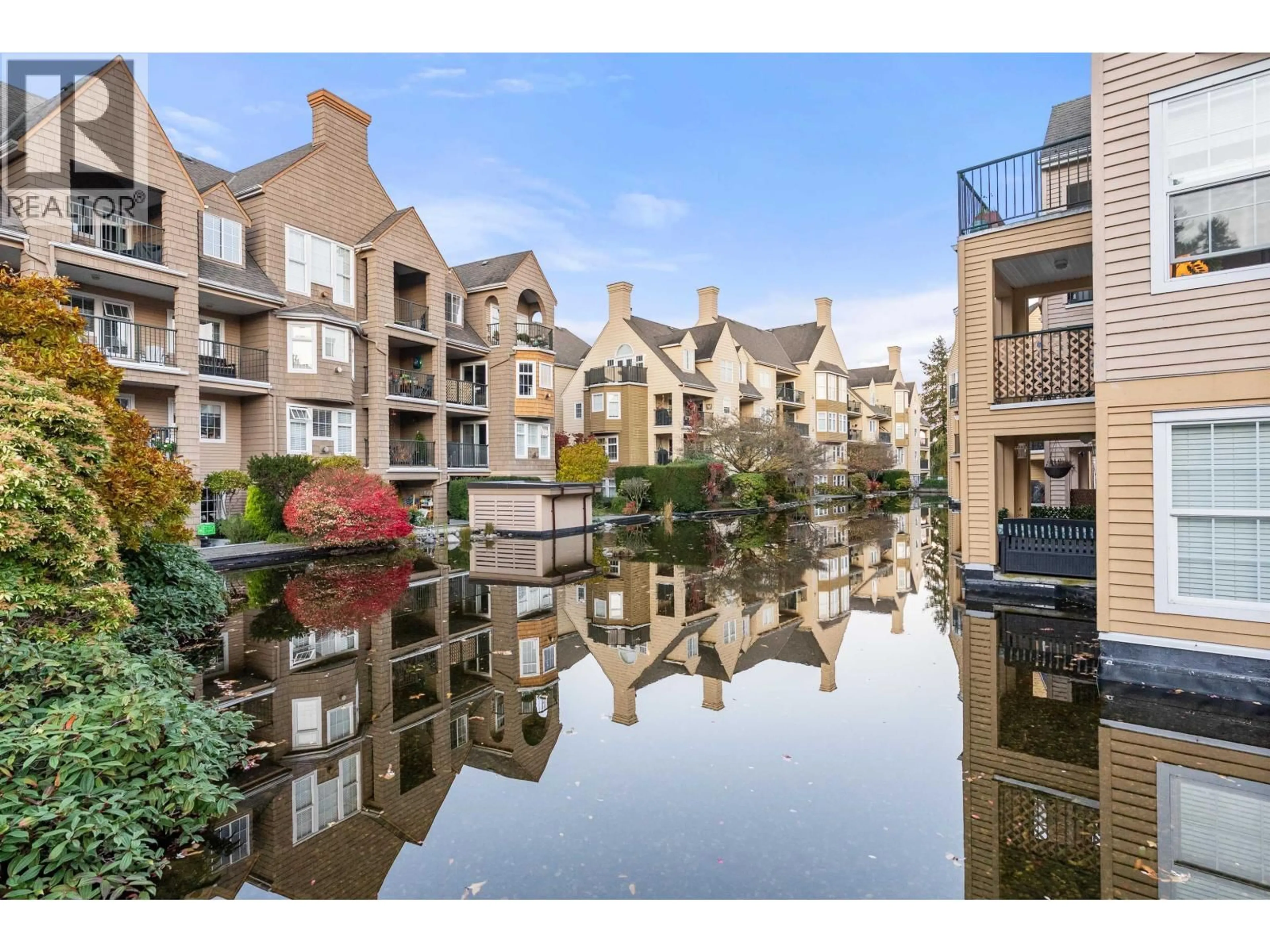 A pic from outside/outdoor area/front of a property/back of a property/a pic from drone, water/lake/river/ocean view for 405 - 5556 14 AVENUE, Delta British Columbia V4M4E7