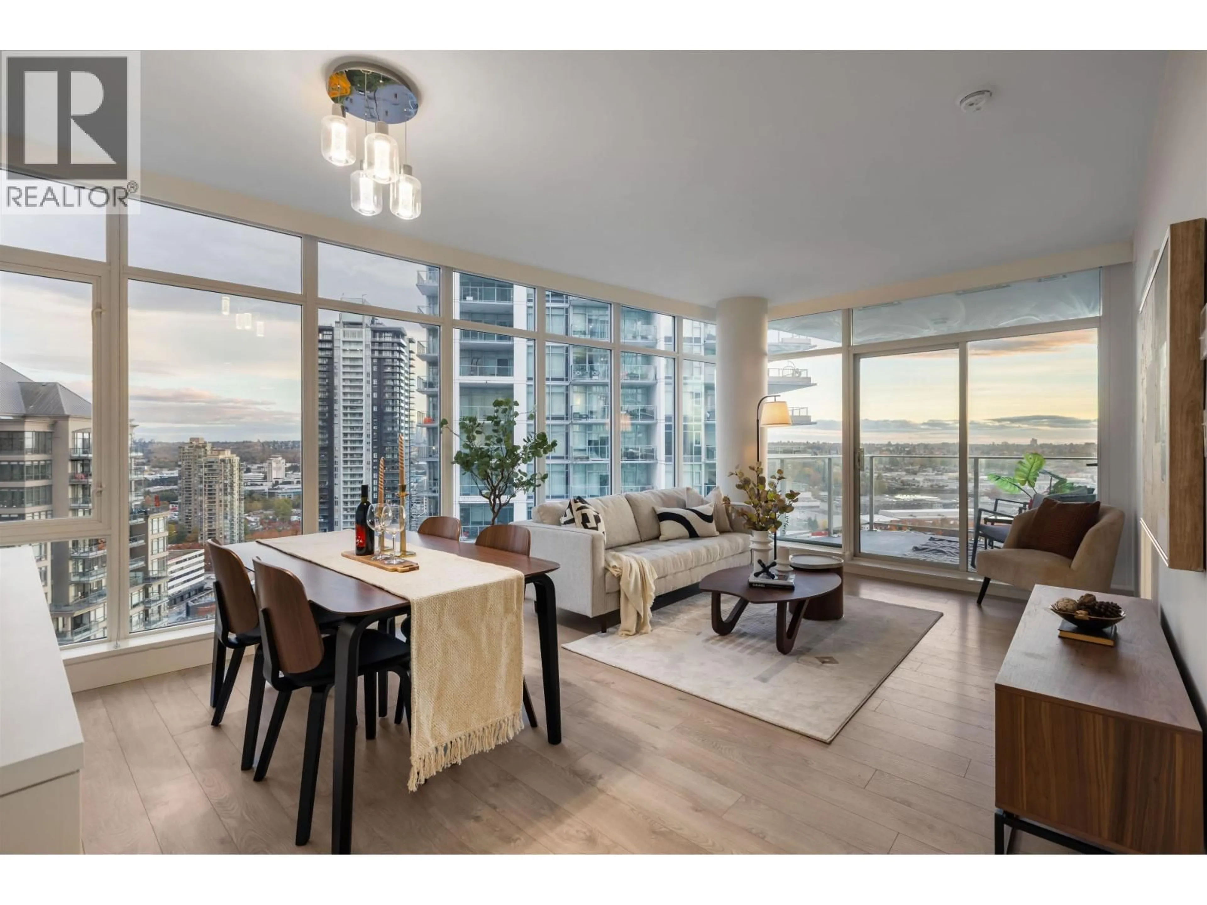 Living room with furniture, wood/laminate floor for 2402 - 1788 GILMORE AVENUE, Burnaby British Columbia V5C0L5