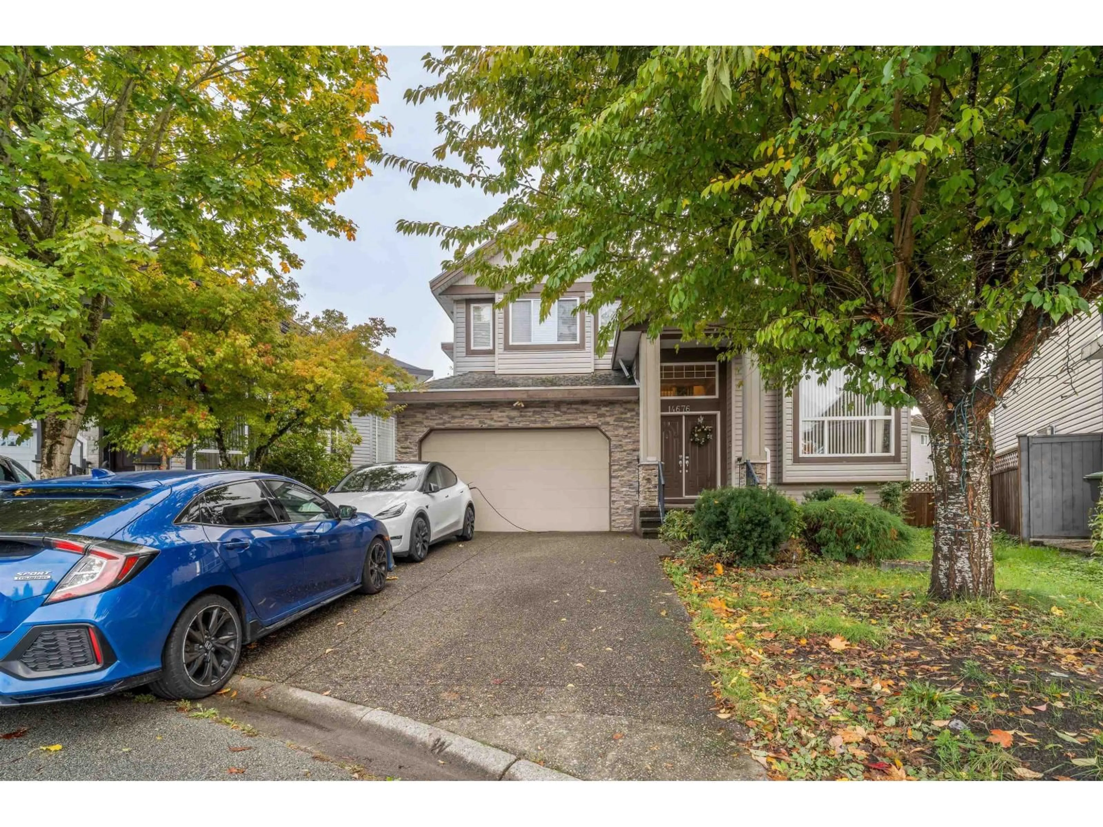 Home with vinyl exterior material, street for 14676 79, Surrey British Columbia V3S2W2