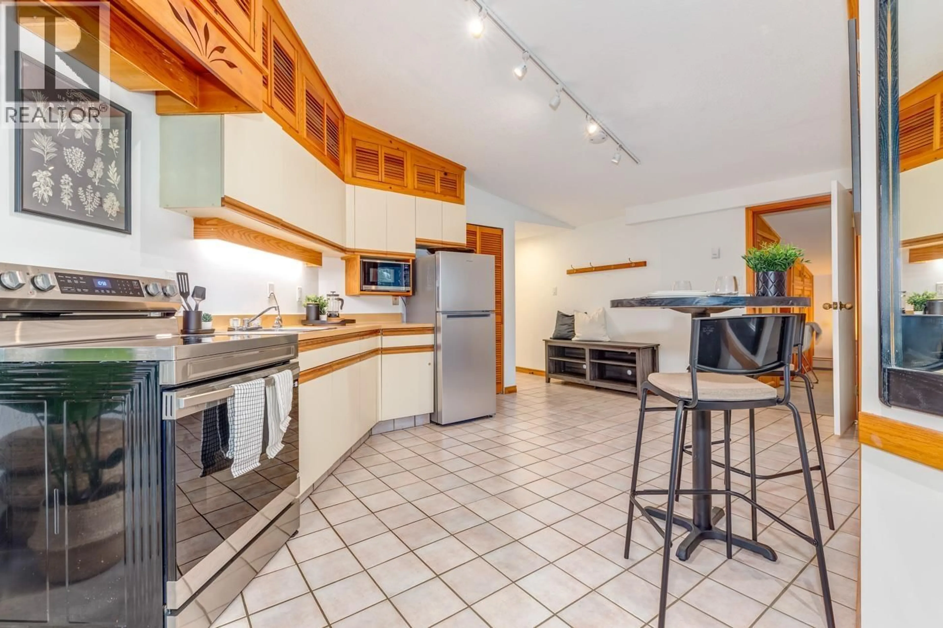 Open concept kitchen, ceramic/tile floor for 417 - 2111 WHISTLER ROAD, Whistler British Columbia V8E0A6