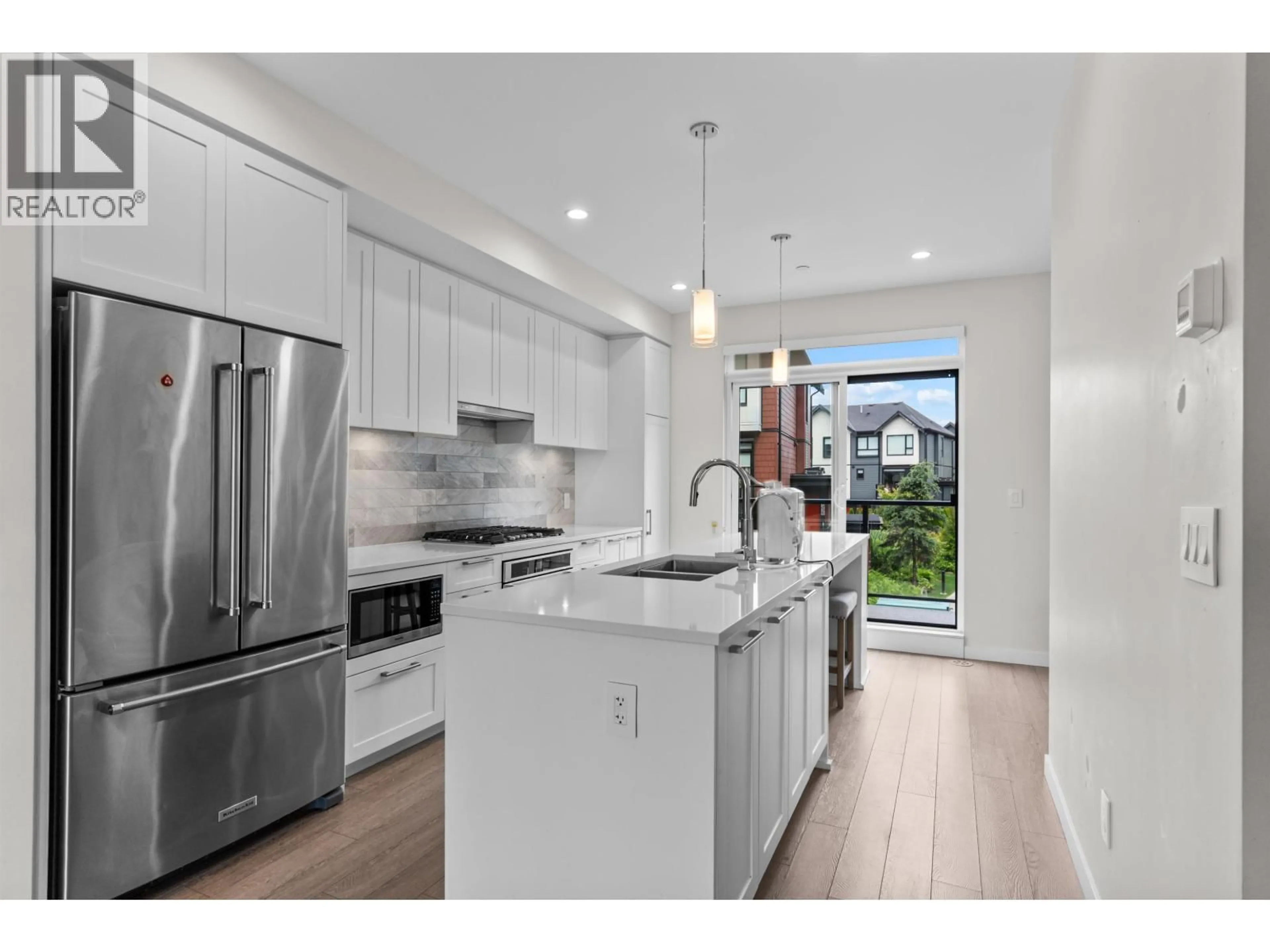 Open concept kitchen, ceramic/tile floor for 133 - 4738 HEMLOCK WAY, Tsawwassen British Columbia V4M0E3