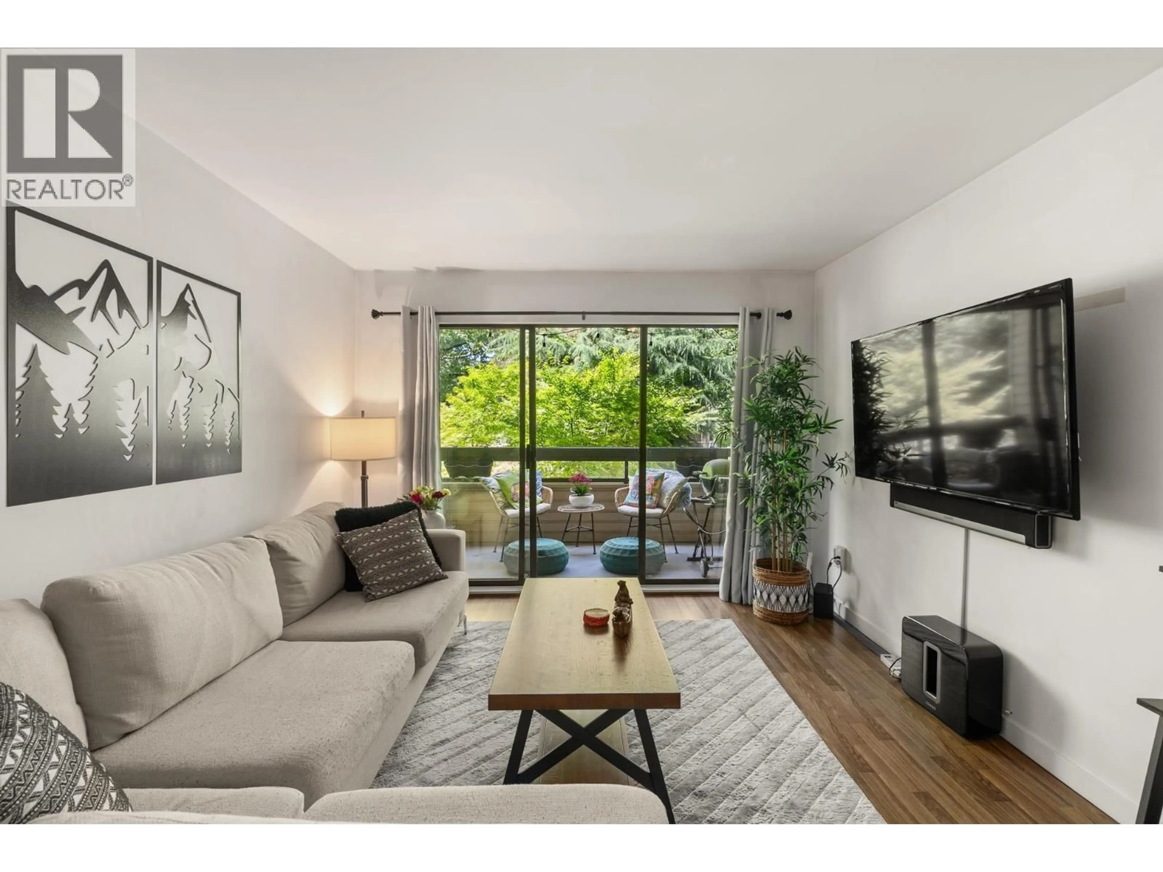 Living room with furniture, wood/laminate floor for 206 - 2234 PRINCE ALBERT STREET, Vancouver British Columbia V5T4K9