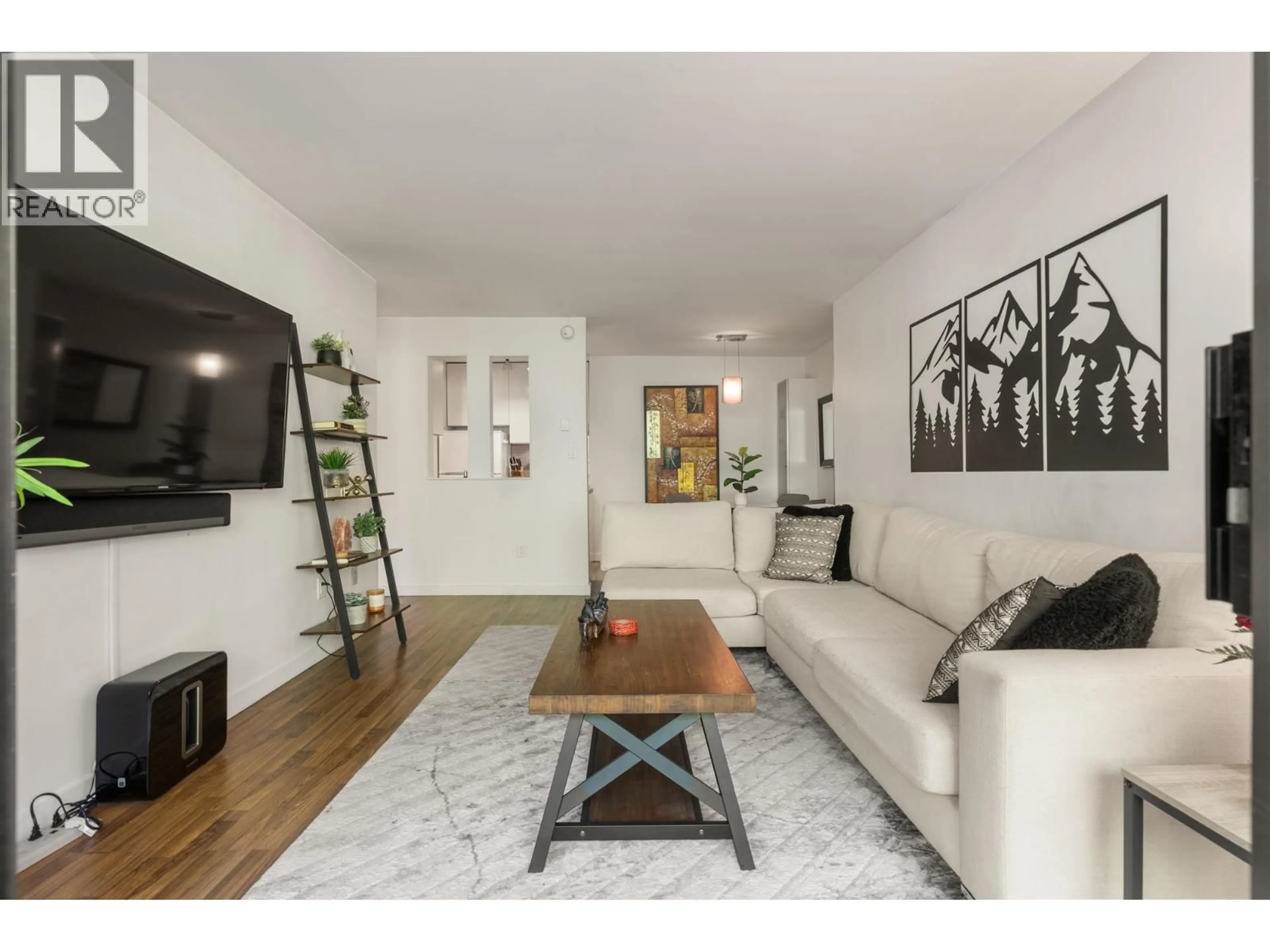 Living room with furniture, wood/laminate floor for 206 - 2234 PRINCE ALBERT STREET, Vancouver British Columbia V5T4K9