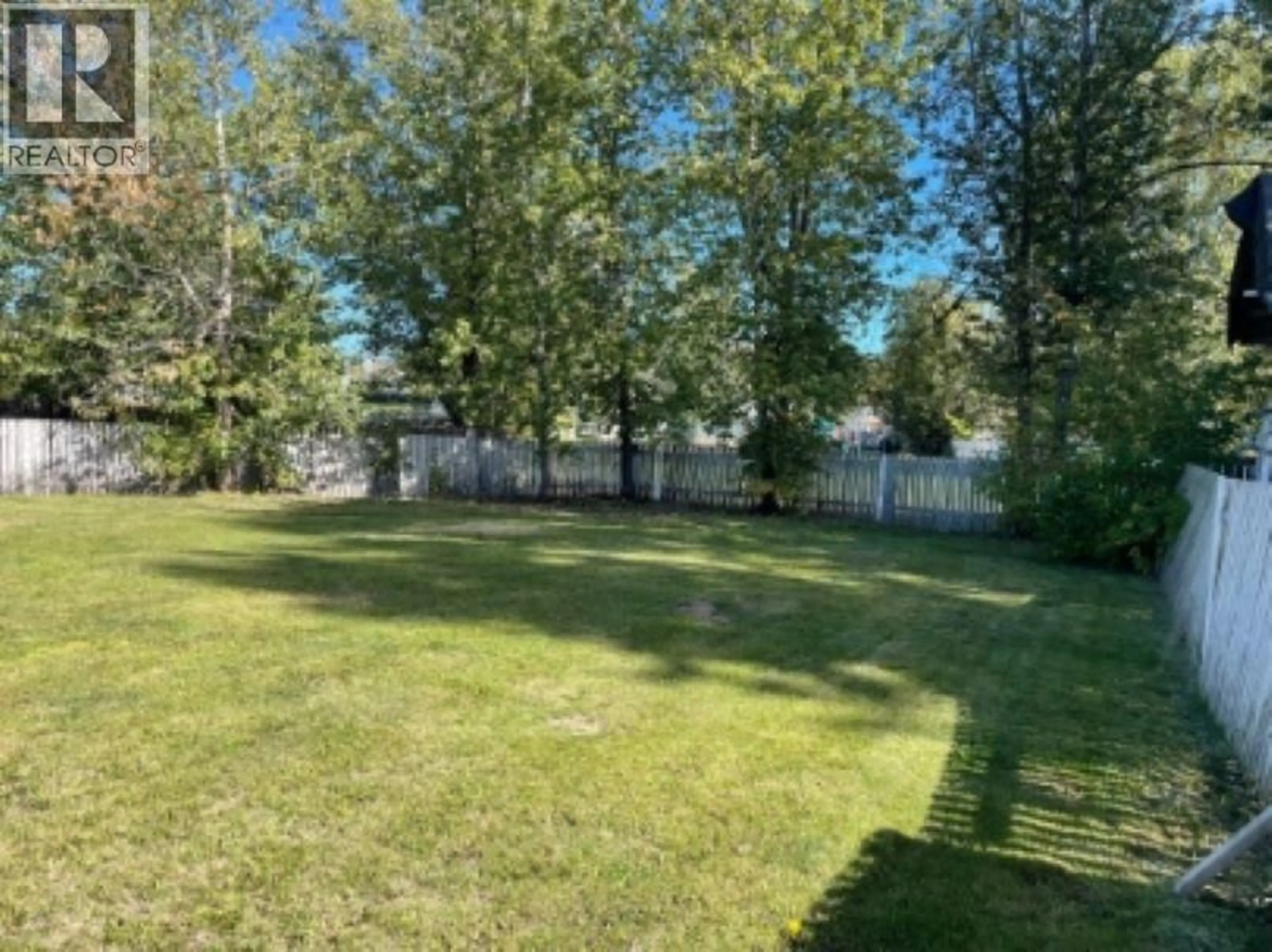 A pic from outside/outdoor area/front of a property/back of a property/a pic from drone, unknown for 5316 WILLOW ROAD, Fort Nelson British Columbia V0C1R0