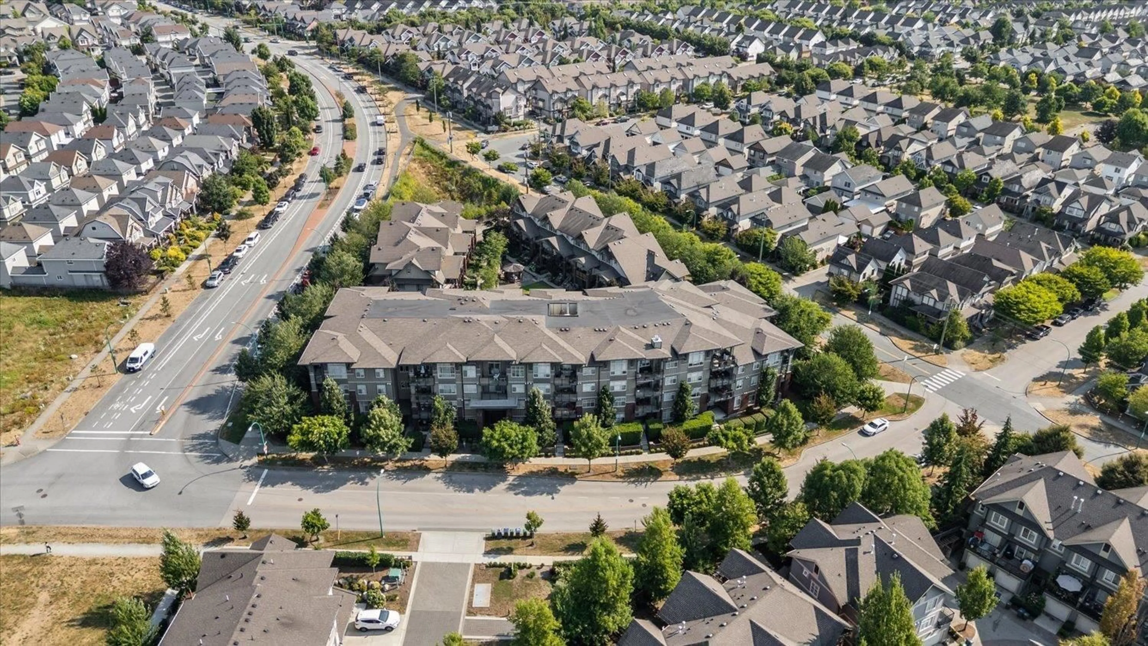 A pic from outside/outdoor area/front of a property/back of a property/a pic from drone, unknown for 202 - 19201 66A, Surrey British Columbia V4N6N7