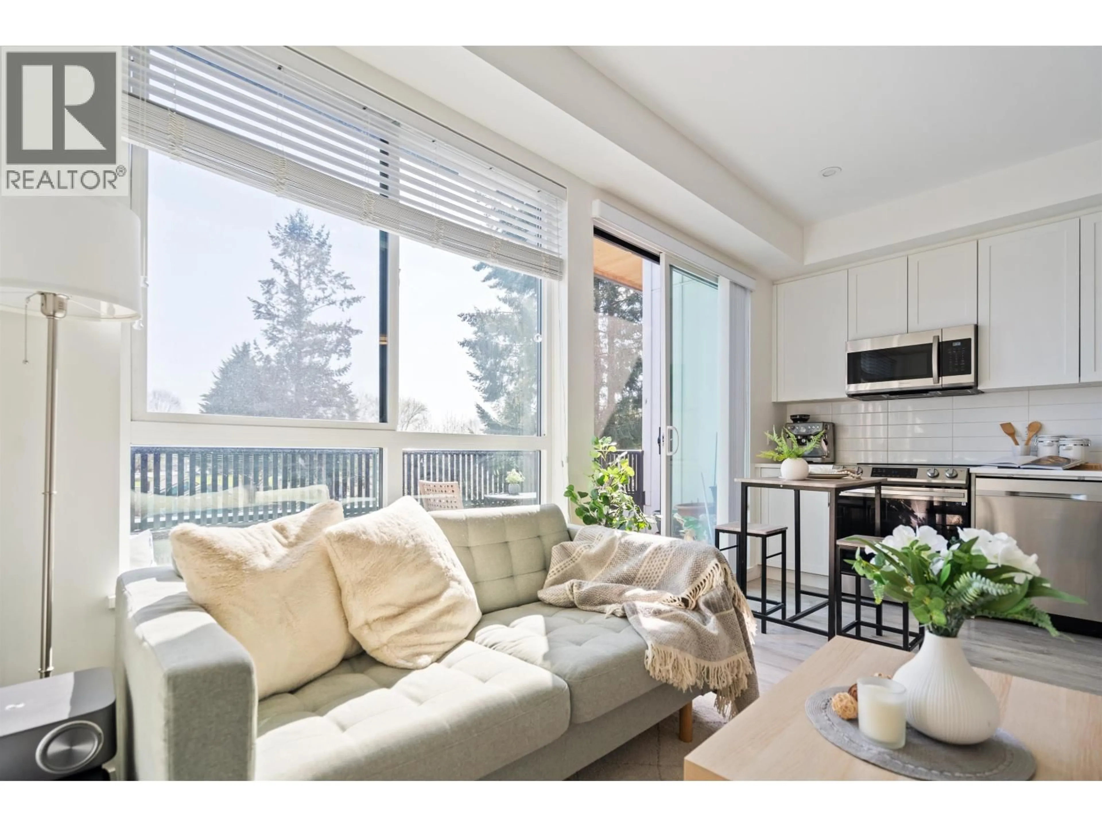 Living room with furniture, wood/laminate floor for 404 - 2160 GRANT AVENUE, Port Coquitlam British Columbia V3B0T3