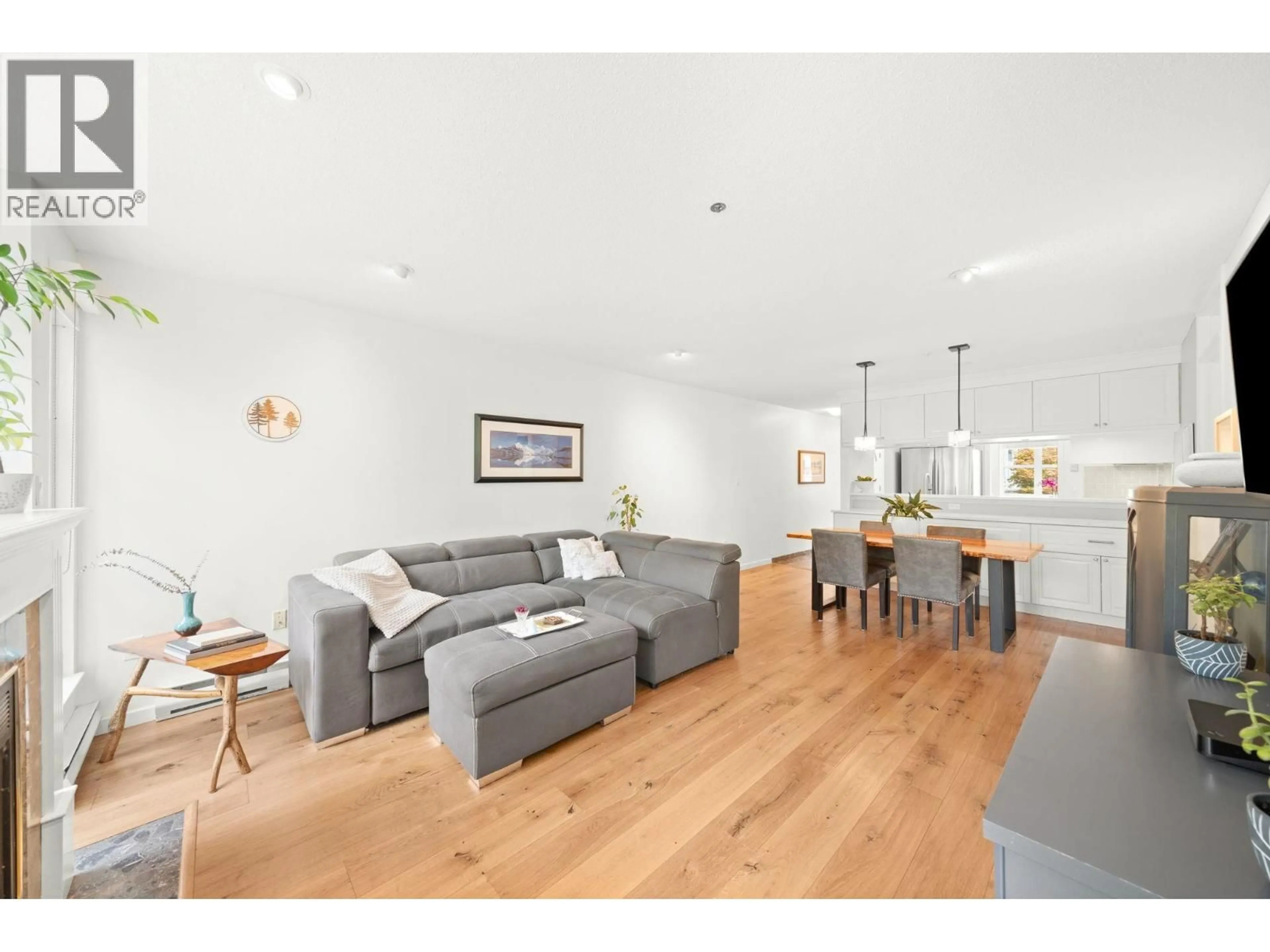 Living room with furniture, wood/laminate floor for 301 - 8728 SW MARINE DRIVE, Vancouver British Columbia V6P6A4