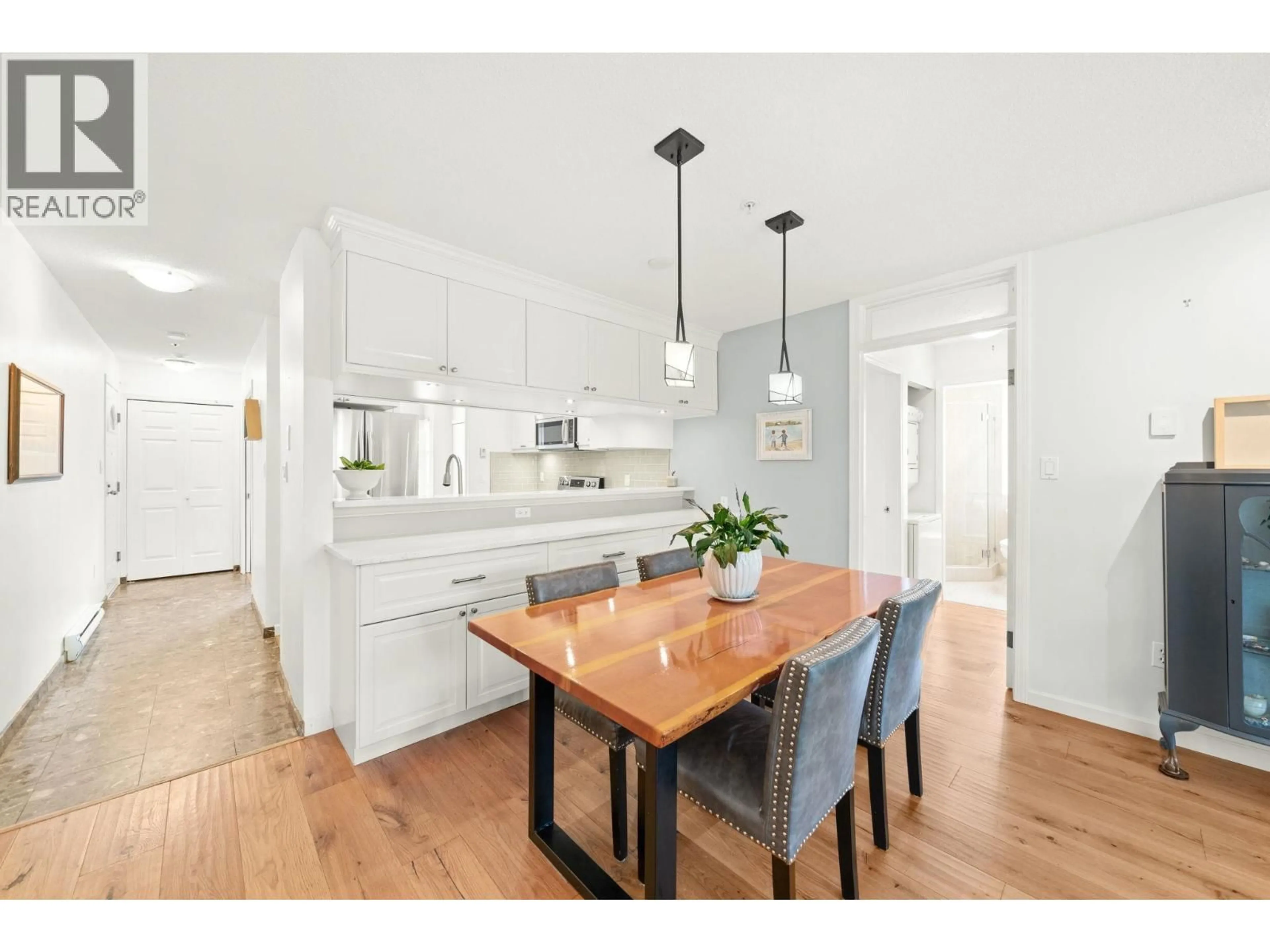 Open concept kitchen, wood/laminate floor for 301 - 8728 SW MARINE DRIVE, Vancouver British Columbia V6P6A4