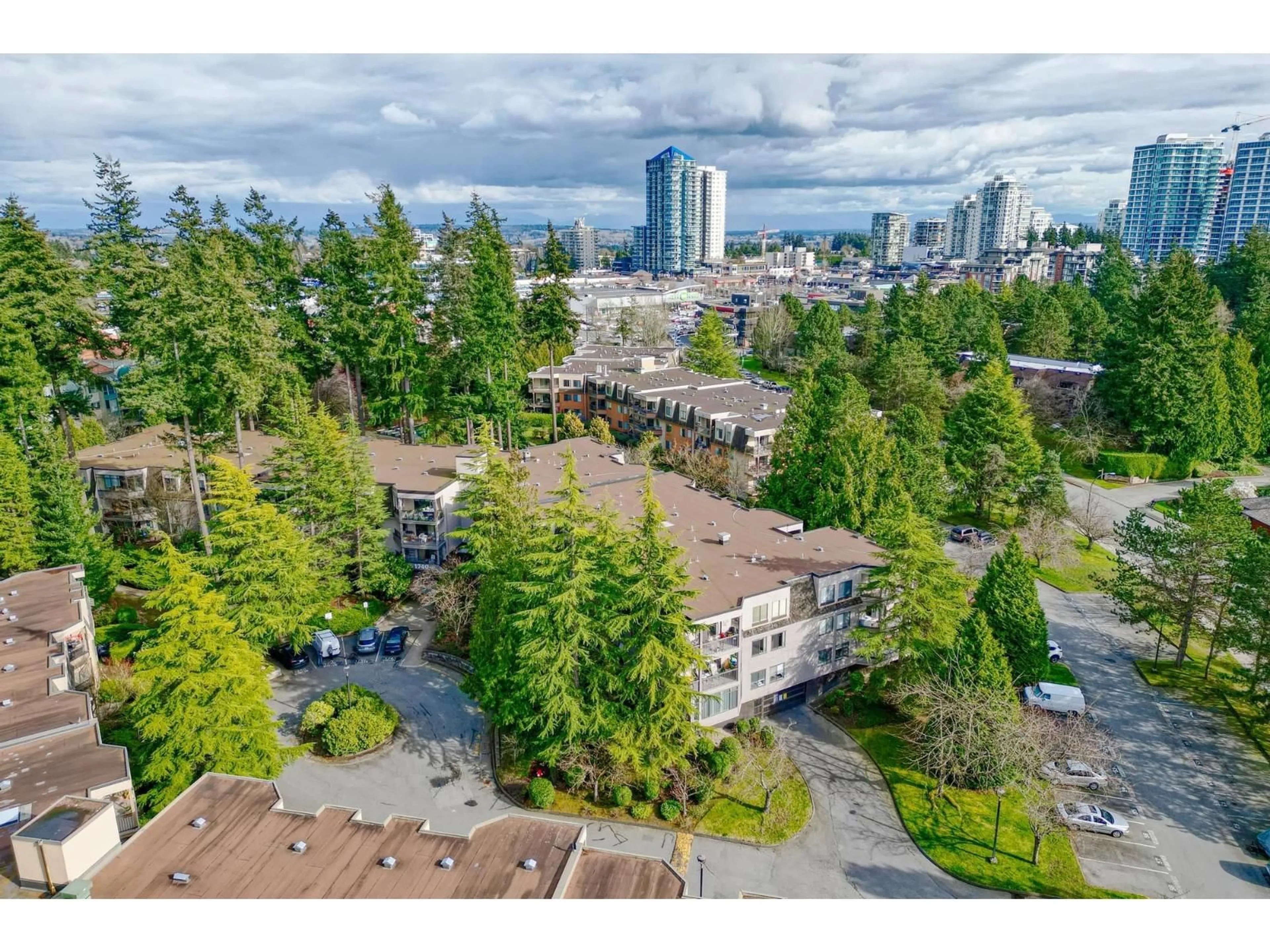 A pic from outside/outdoor area/front of a property/back of a property/a pic from drone, unknown for 203 - 1740 SOUTHMERE, Surrey British Columbia V4A6E4