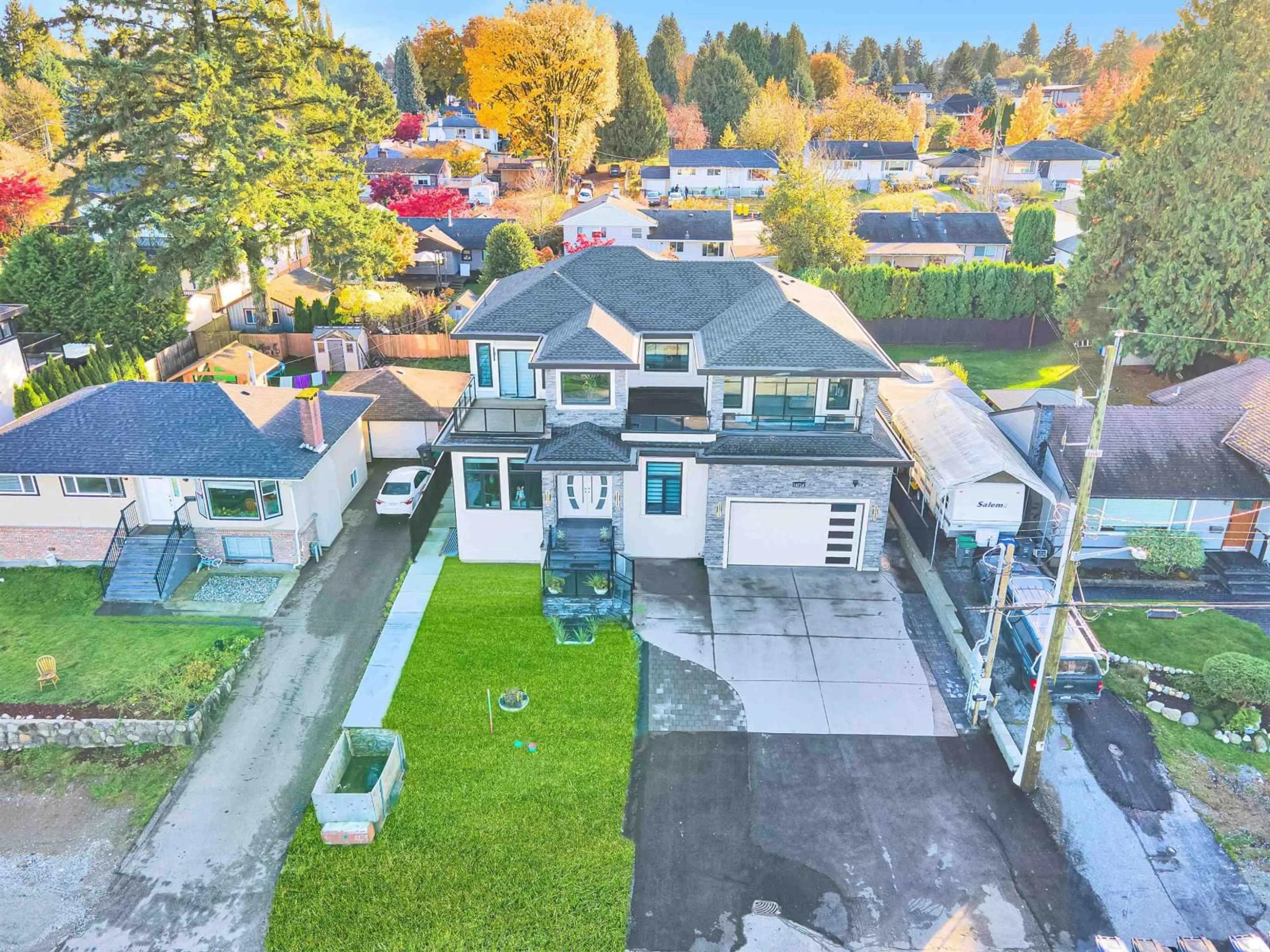 A pic from outside/outdoor area/front of a property/back of a property/a pic from drone, street for 14714 111A, Surrey British Columbia V3R2E1