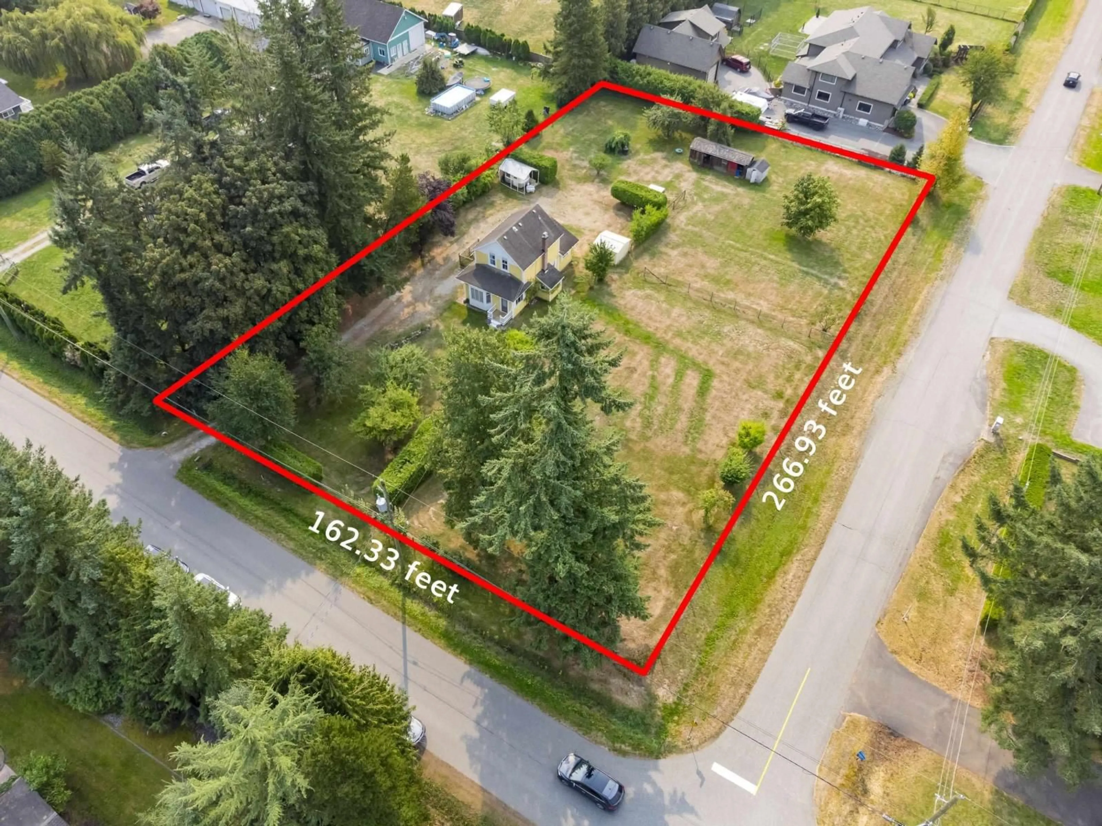 A pic from outside/outdoor area/front of a property/back of a property/a pic from drone, street for 24666 50, Langley British Columbia V2Z1E7