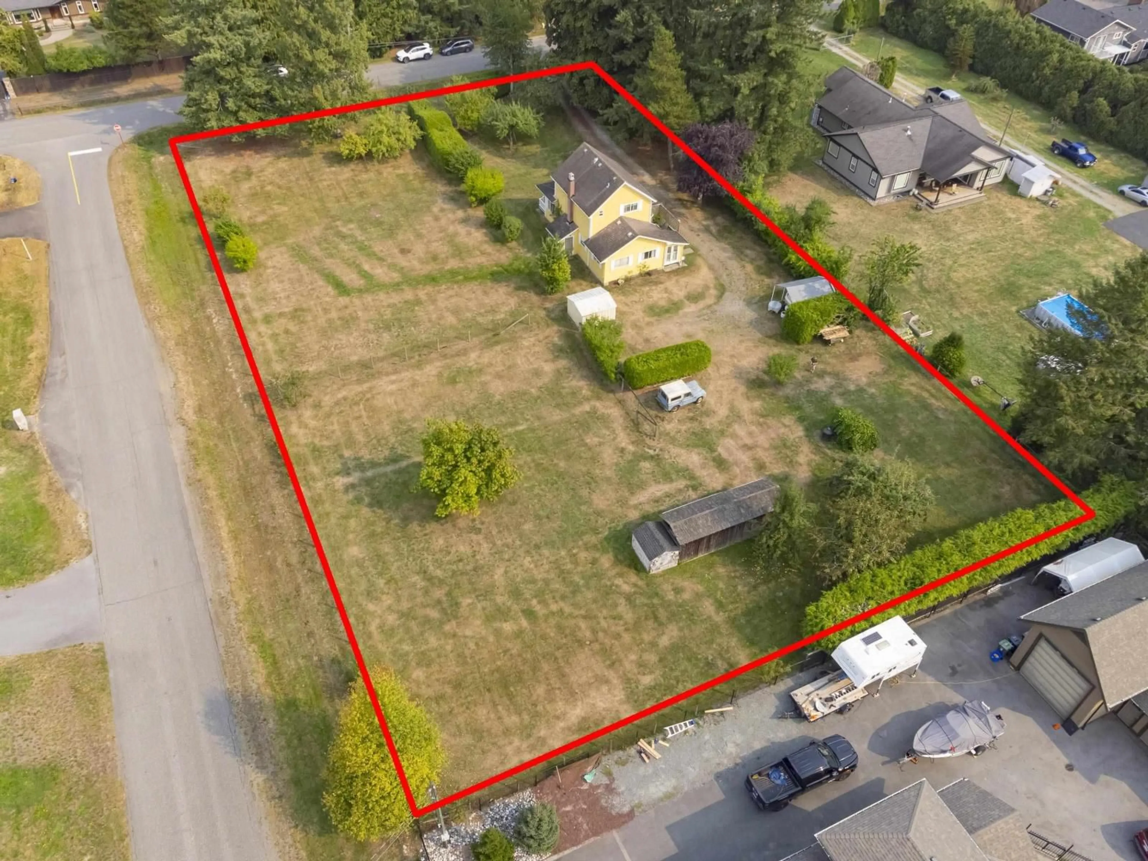 A pic from outside/outdoor area/front of a property/back of a property/a pic from drone, street for 24666 50, Langley British Columbia V2Z1E7