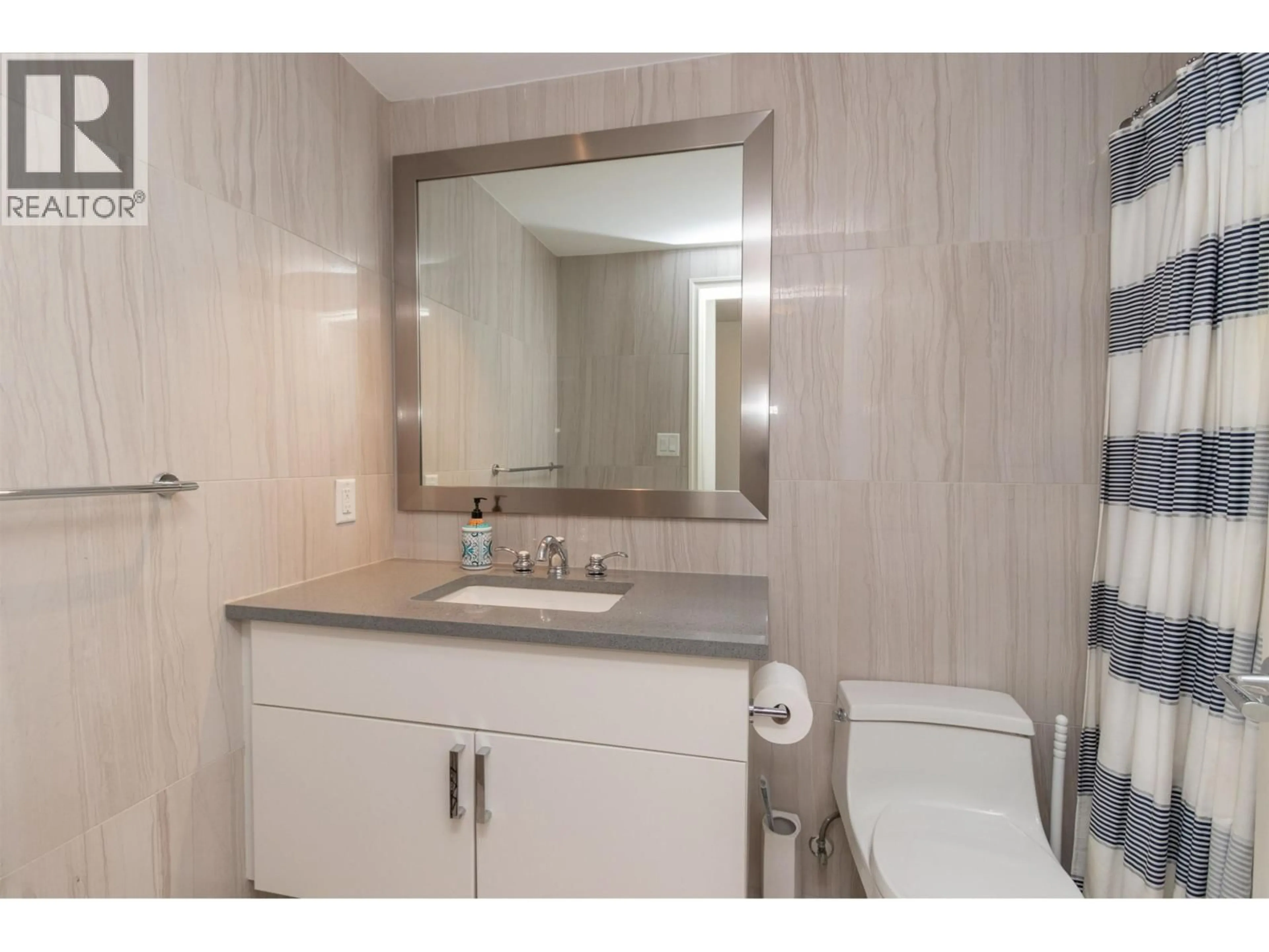 Standard bathroom, ceramic/tile floor for 705 - 199 VICTORY SHIP WAY, North Vancouver British Columbia V7N0E2