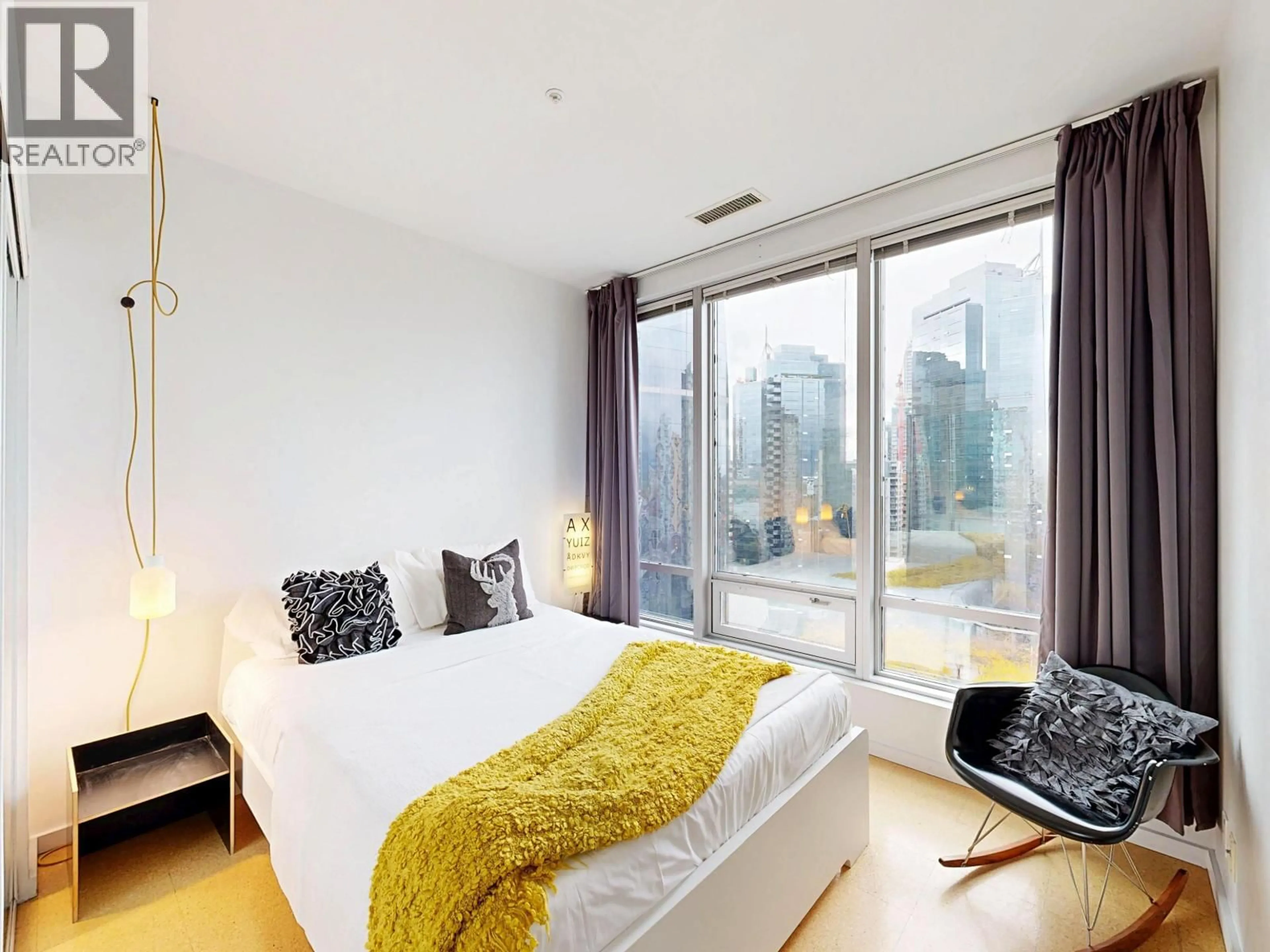 Bedroom with bed, wood/laminate floor for 1207 - 989 NELSON STREET, Vancouver British Columbia V6Z2S1