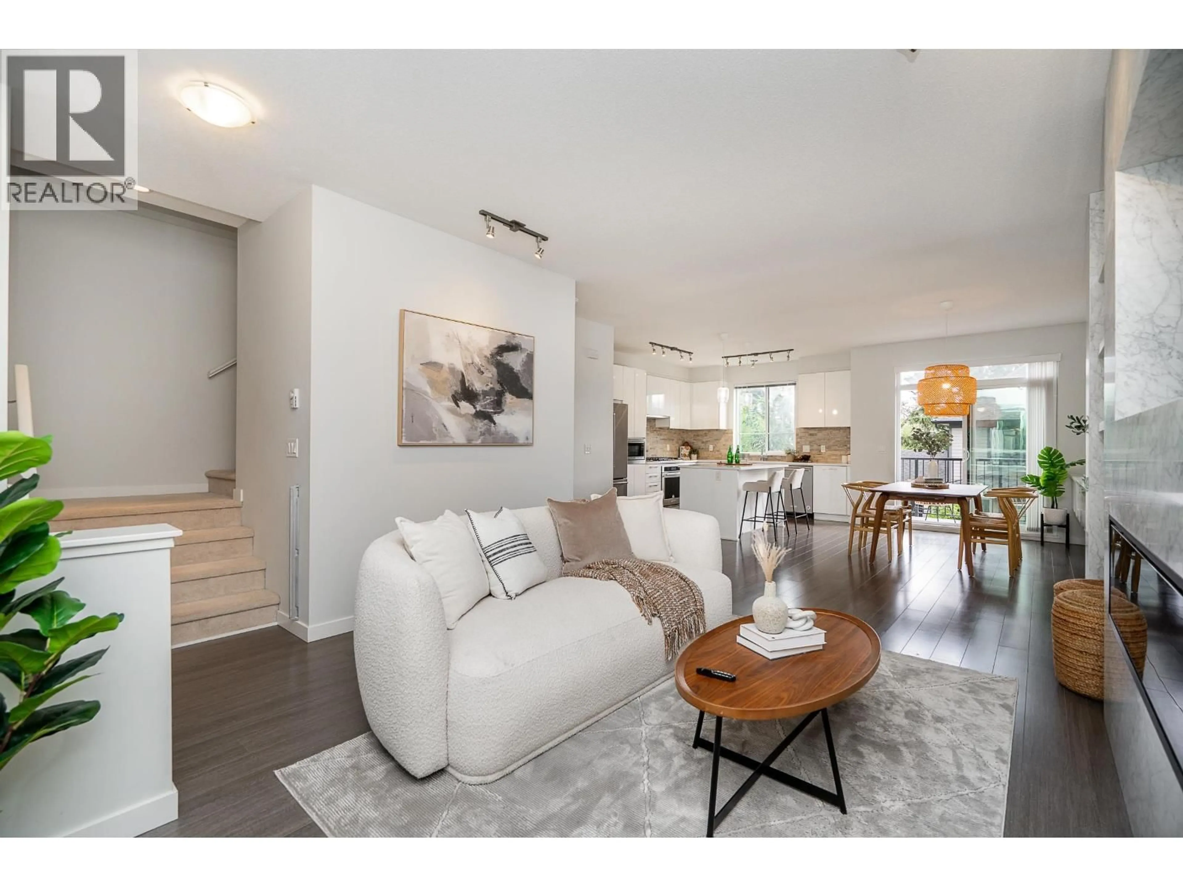 Living room with furniture, unknown for 140 - 3500 BURKE VILLAGE PROMENADE, Coquitlam British Columbia V3E0N2