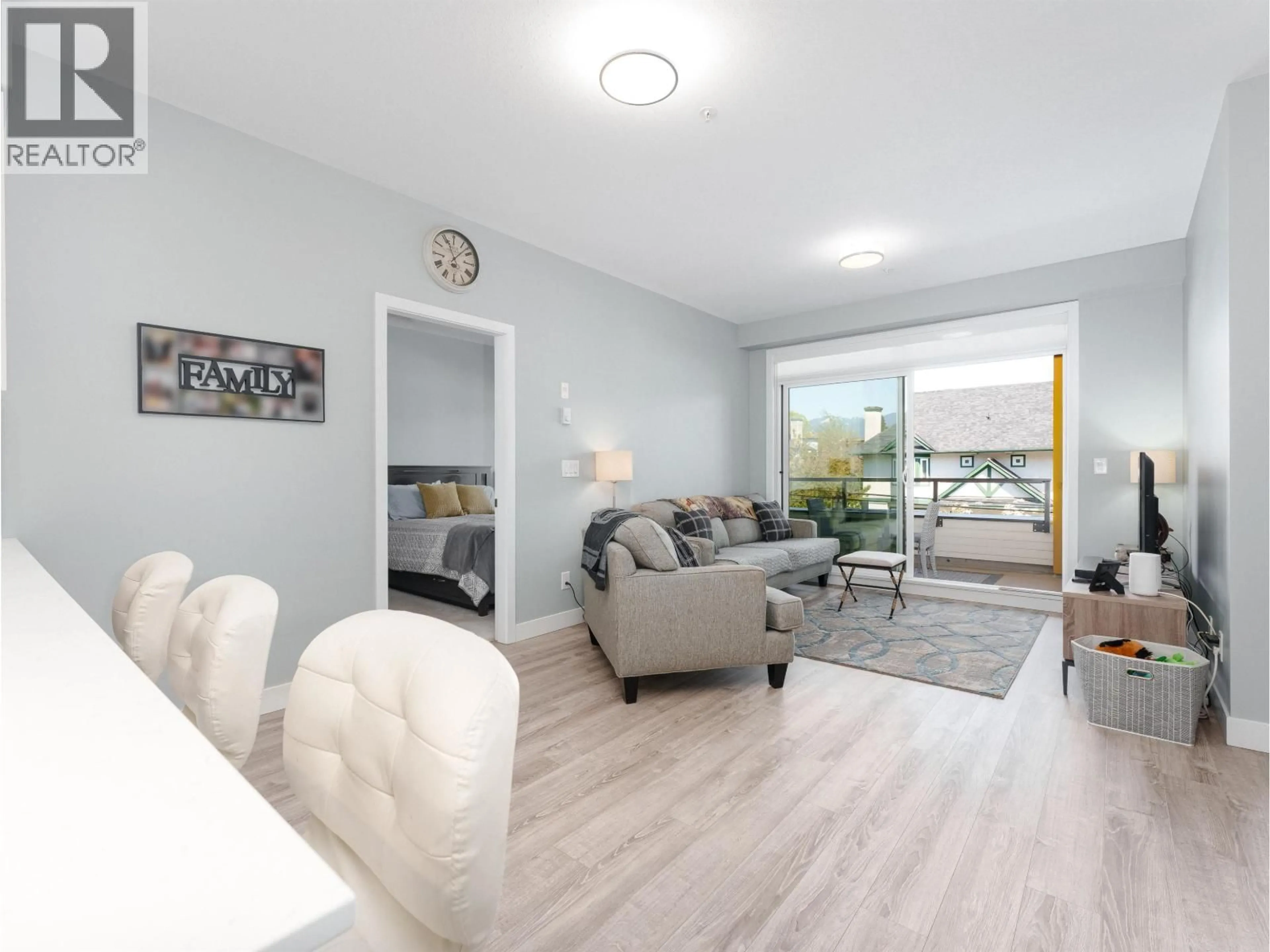 Living room with furniture, unknown for 301 - 3971 HASTINGS STREET, Burnaby British Columbia V5C2H8