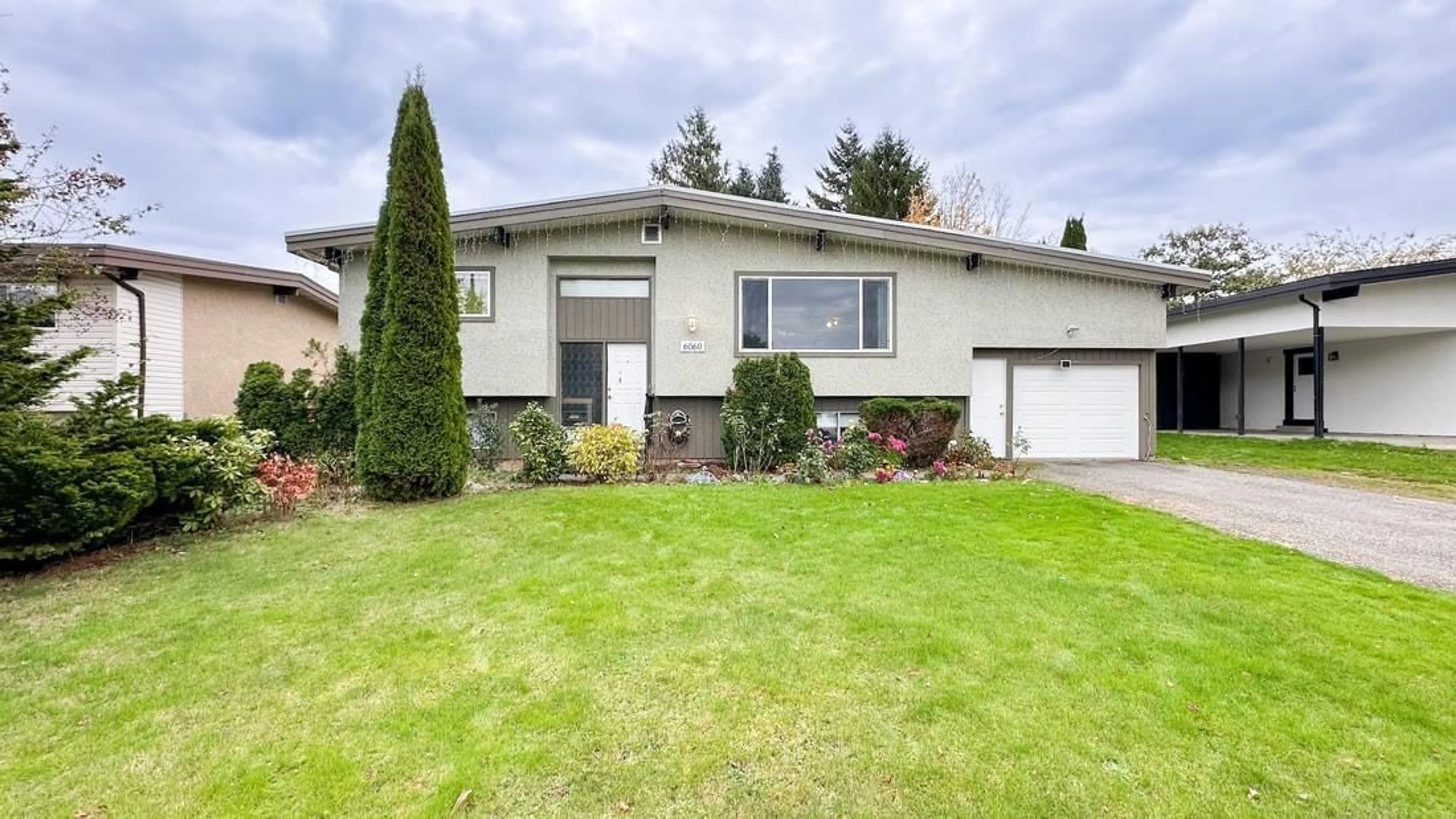 Home with vinyl exterior material, street for 6060 GLENMORE DRIVE, Chilliwack British Columbia V2R2H5