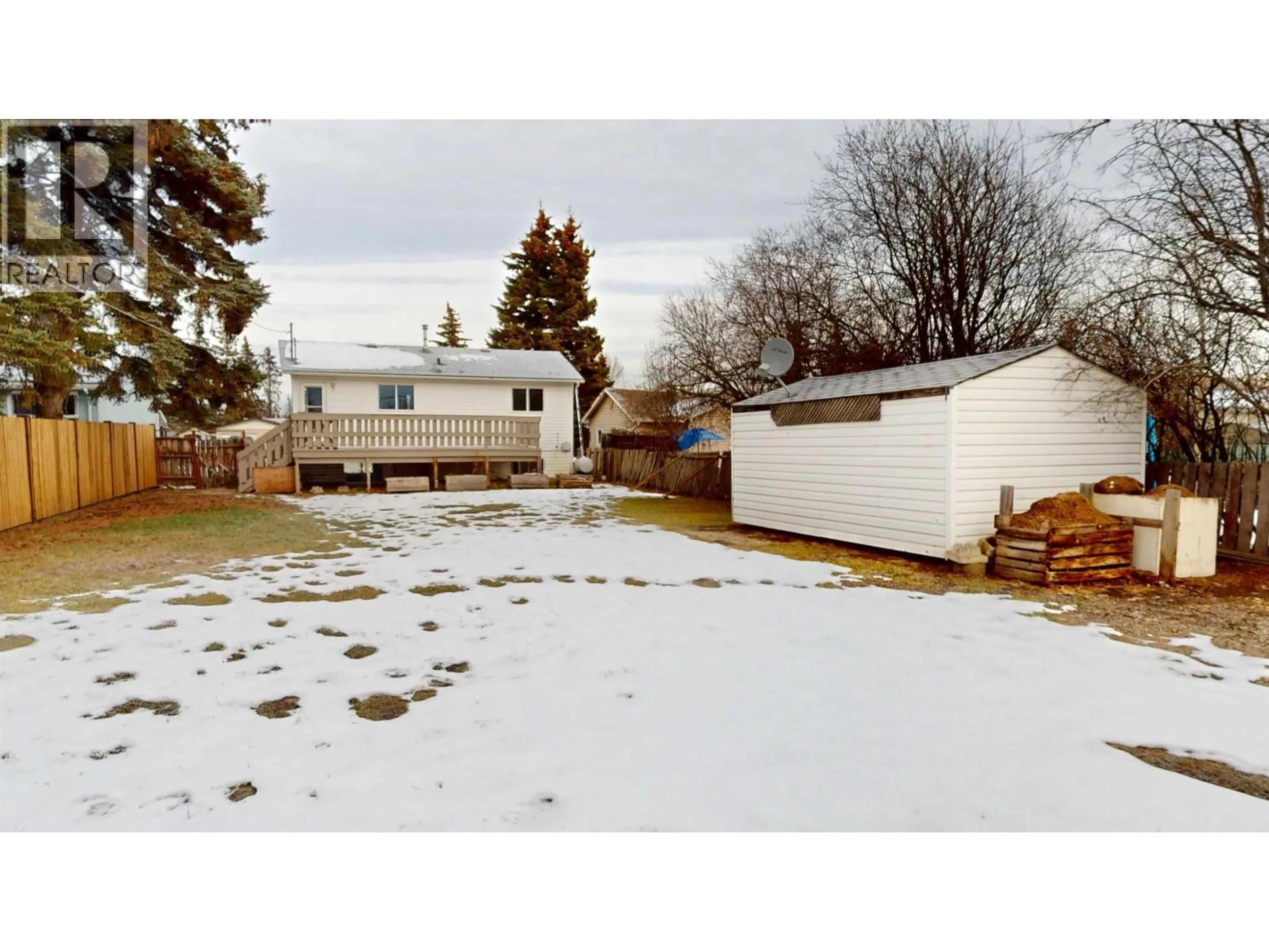 A pic from outside/outdoor area/front of a property/back of a property/a pic from drone, street for 9115 105 AVENUE, Fort St. John British Columbia V1J2L5