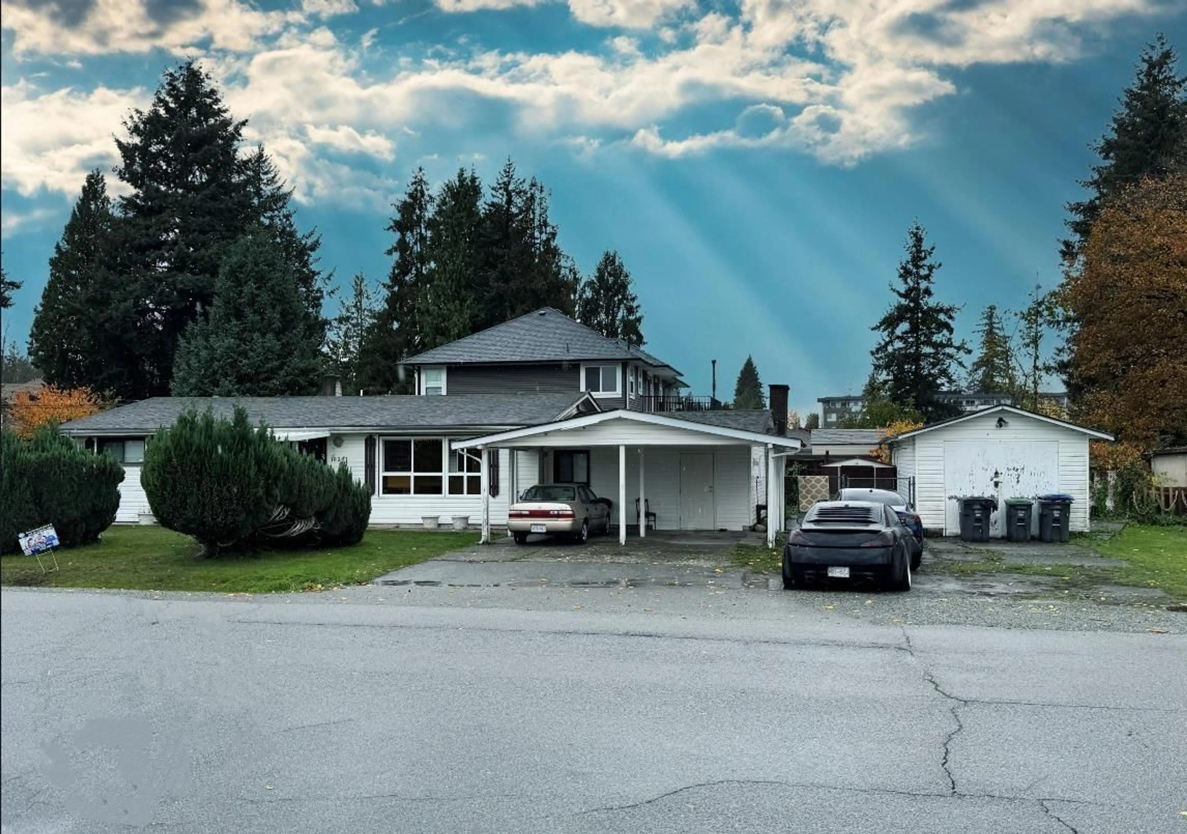 A pic from outside/outdoor area/front of a property/back of a property/a pic from drone, street for 10307 146, Surrey British Columbia V3R3T3