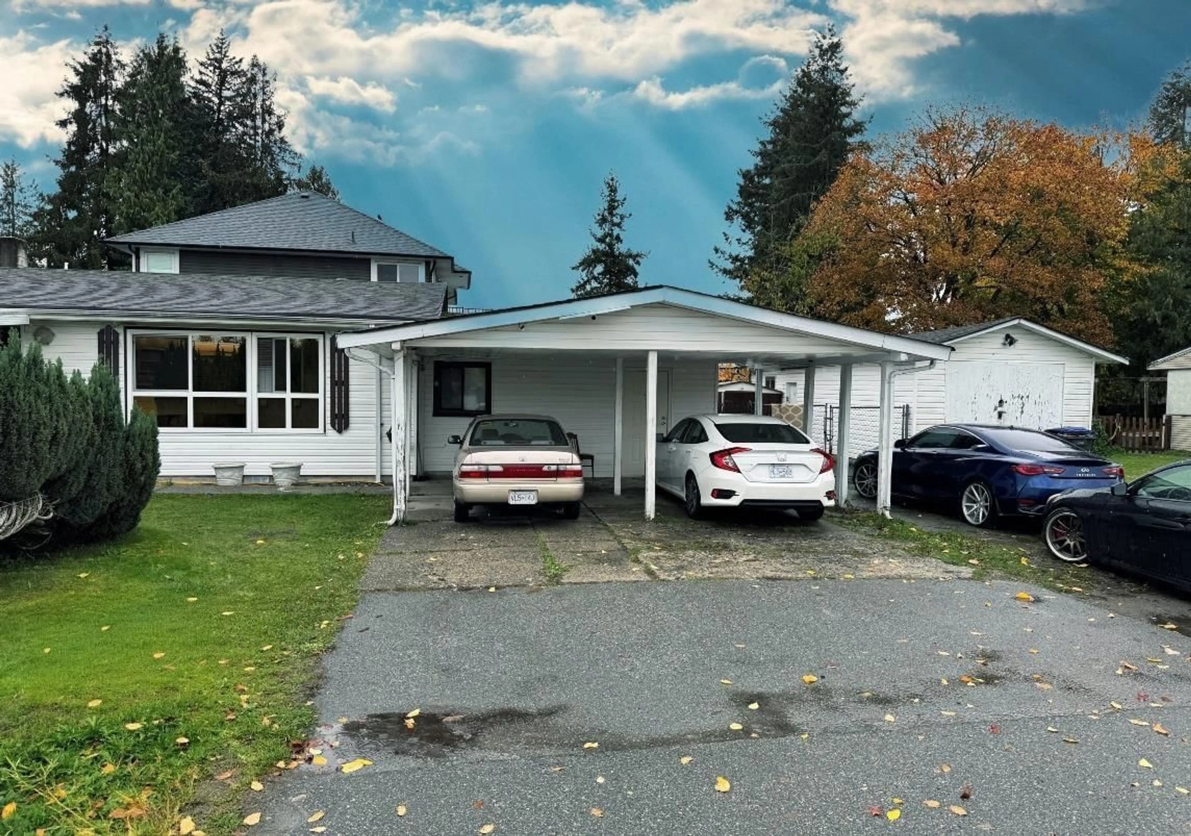 A pic from outside/outdoor area/front of a property/back of a property/a pic from drone, street for 10307 146, Surrey British Columbia V3R3T3