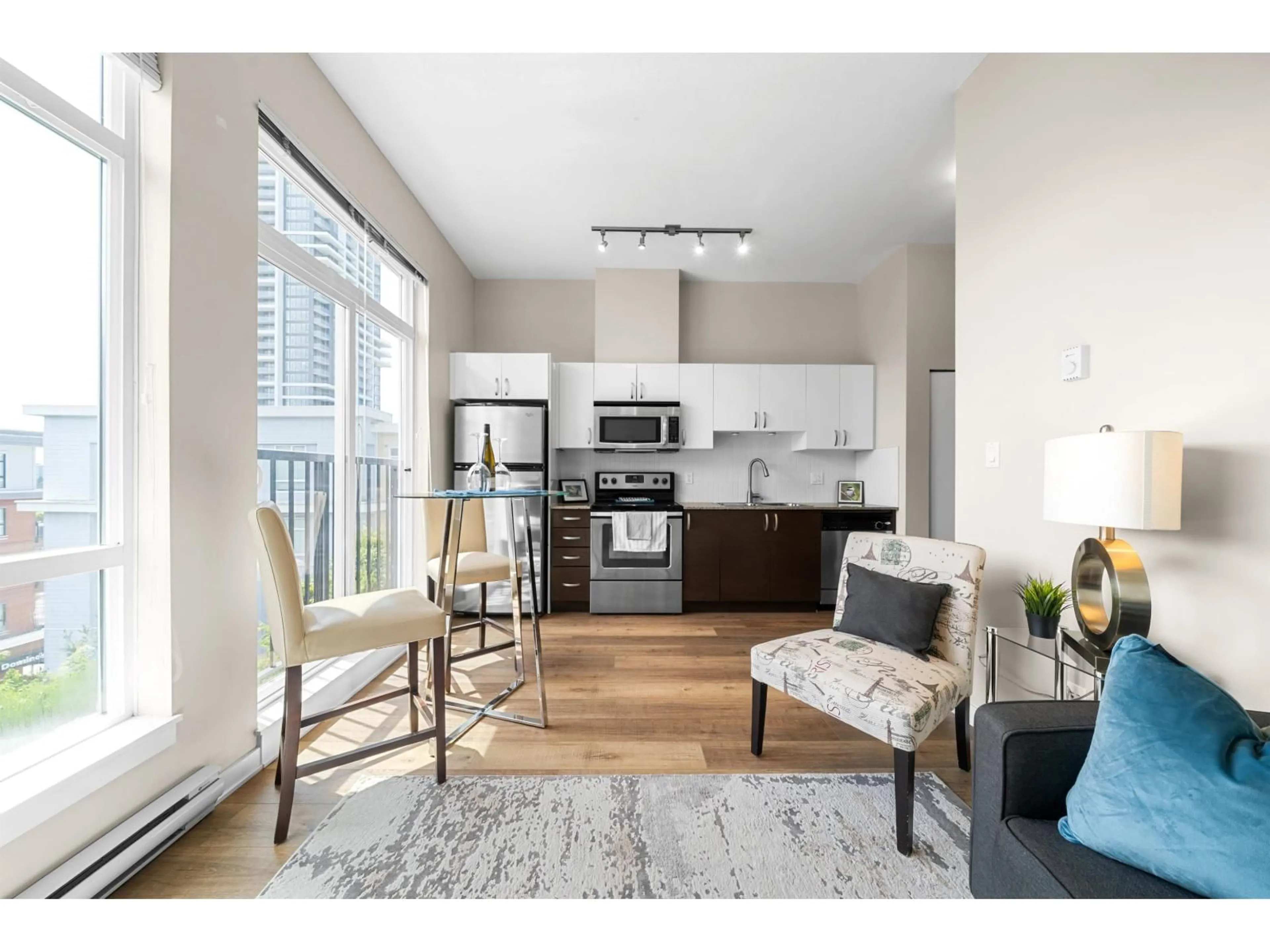 Open concept kitchen, wood/laminate floor for 513 - 13728 108, Surrey British Columbia V3T0G2