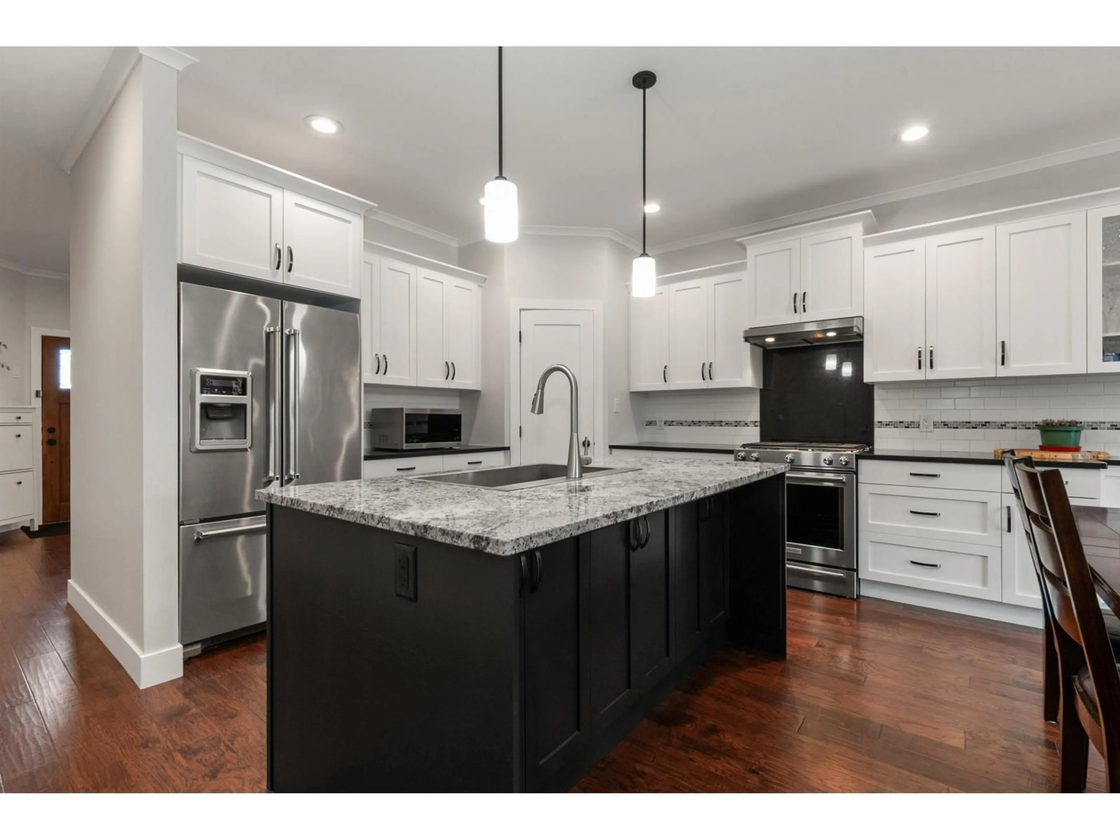 Open concept kitchen, unknown for 6522 REID ROAD, Chilliwack British Columbia V2R1T9