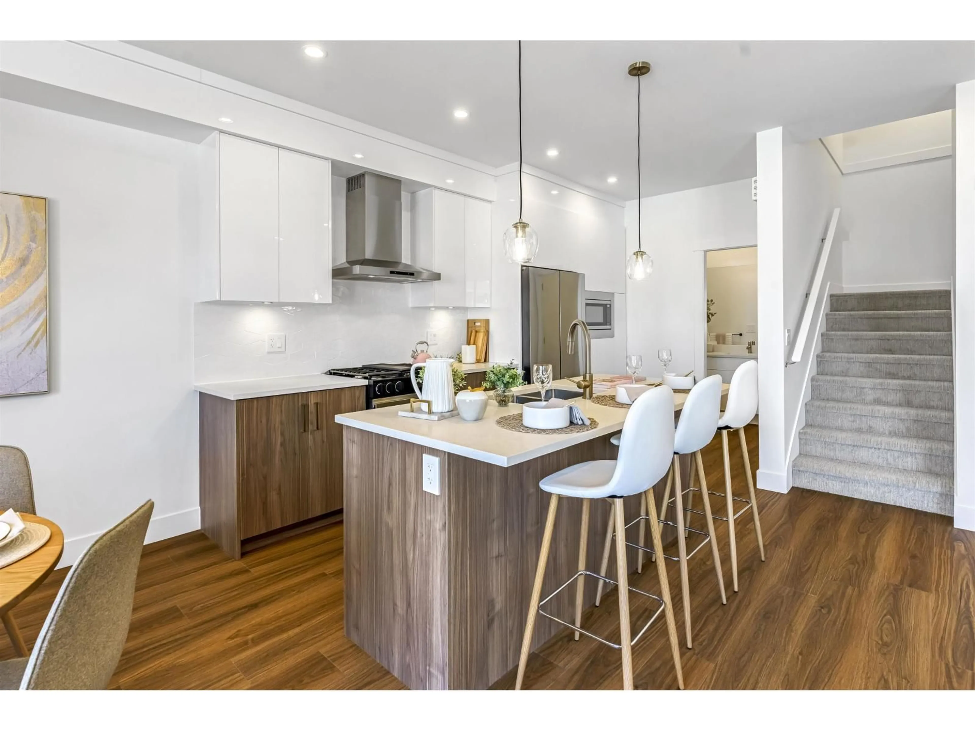 Open concept kitchen, wood/laminate floor for 29 - 6035 141, Surrey British Columbia V3X0L6