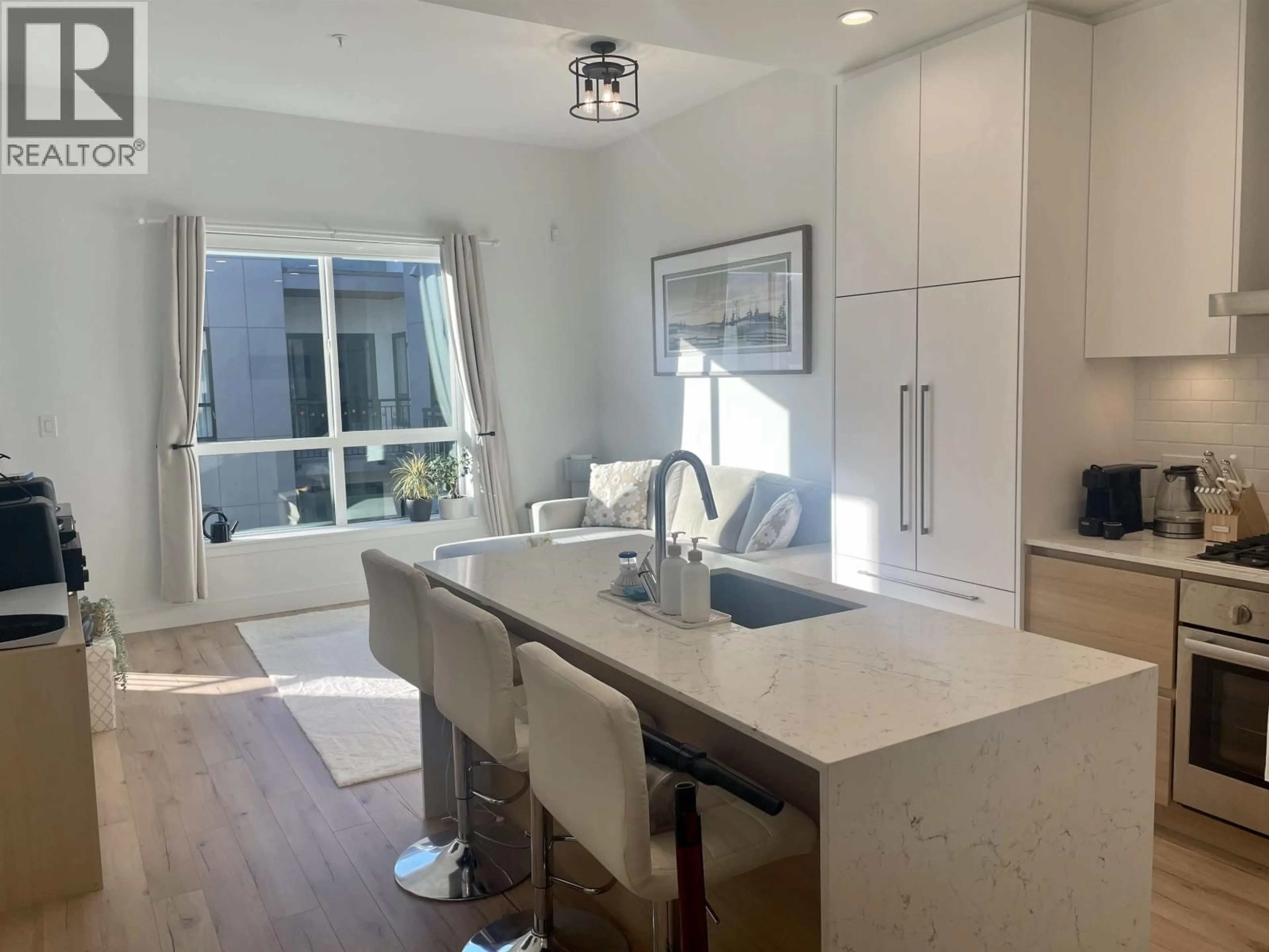 Open concept kitchen, wood/laminate floor for 628 - 55 KLAHANIE DRIVE, Port Moody British Columbia V3H0M9