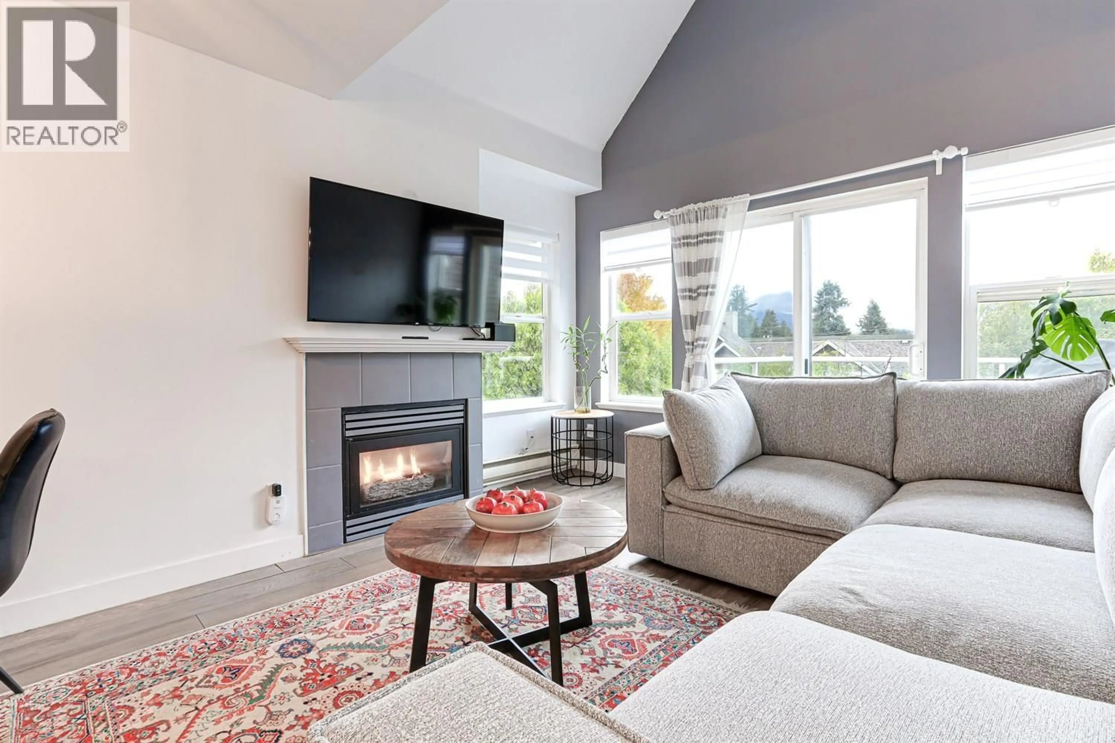 Living room with furniture, unknown for 402 - 1558 GRANT AVENUE, Port Coquitlam British Columbia V3B1P2