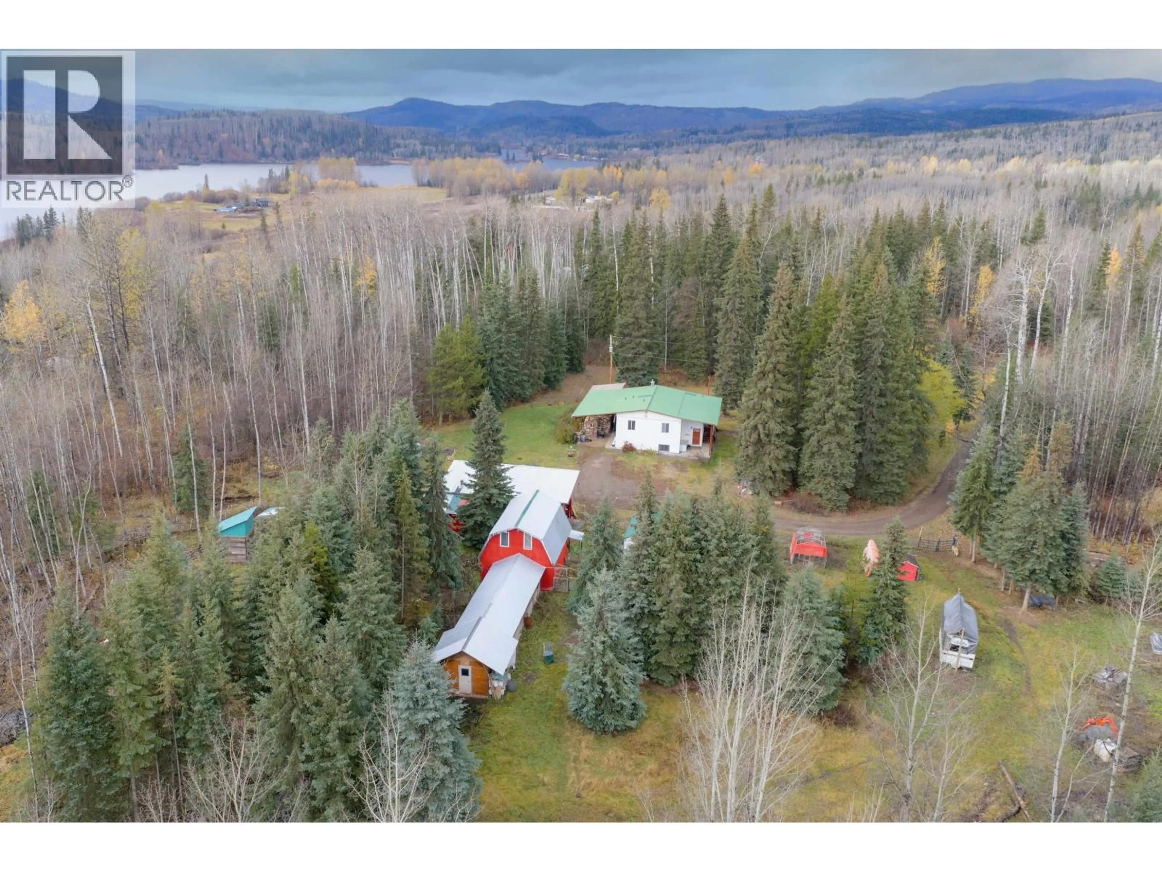 A pic from outside/outdoor area/front of a property/back of a property/a pic from drone, forest/trees view for 11489 ROY ROAD, Burns Lake British Columbia V0J1E1
