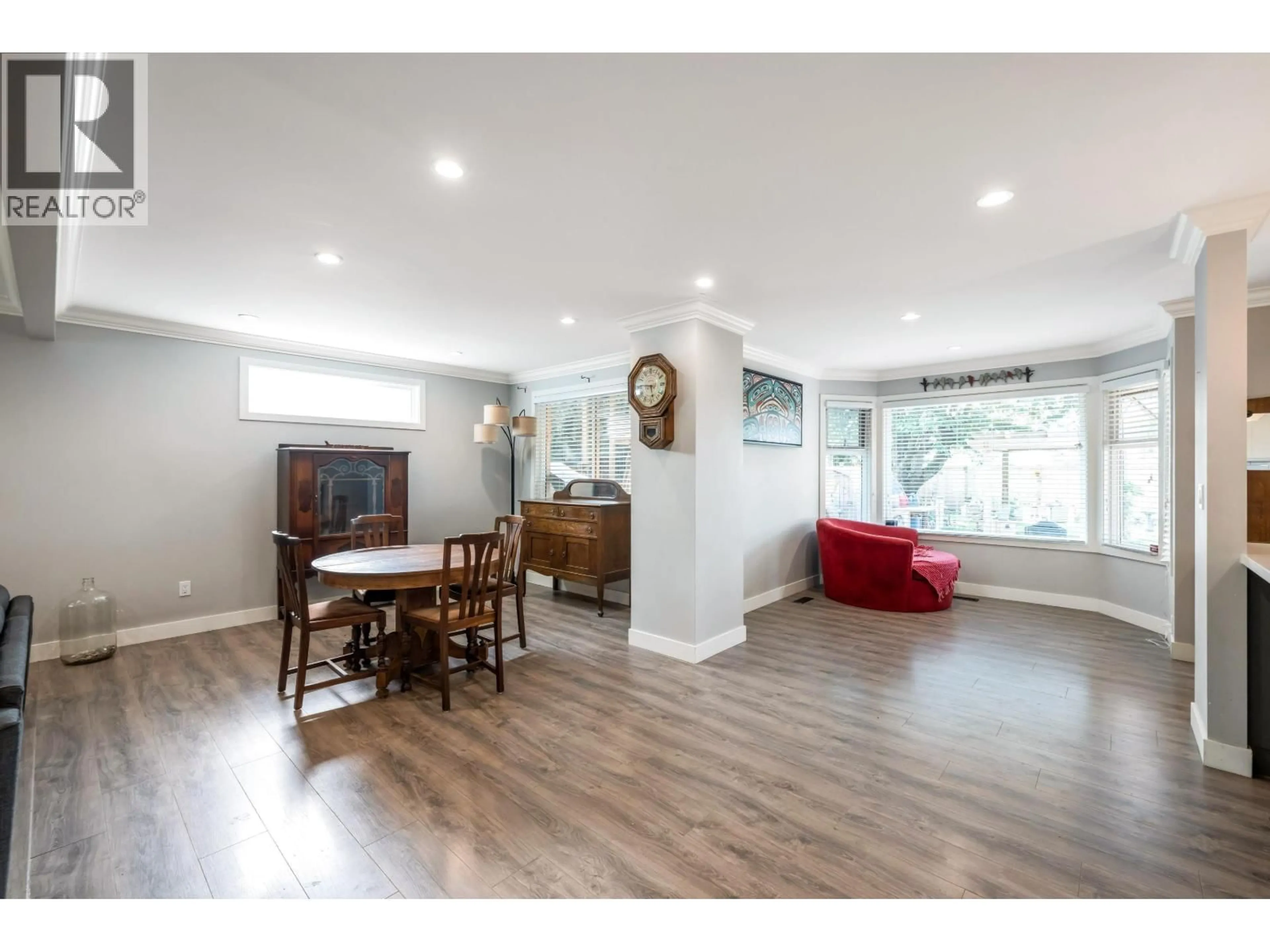 Living room with furniture, wood/laminate floor for 23280 118 AVENUE, Maple Ridge British Columbia V2X9J1