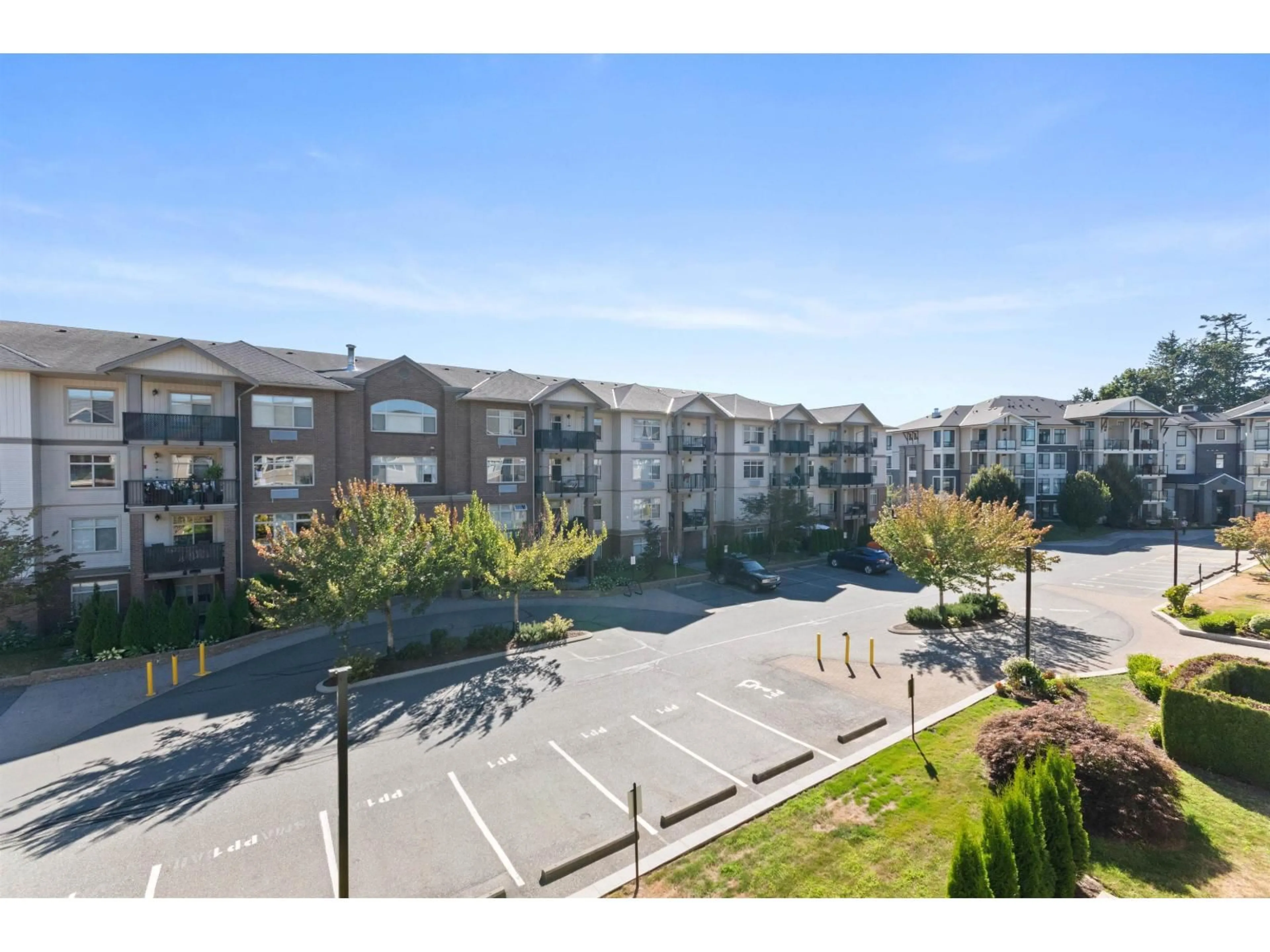 A pic from outside/outdoor area/front of a property/back of a property/a pic from drone, unknown for 318 - 45769 STEVENSON ROAD, Chilliwack British Columbia V2R5Z2