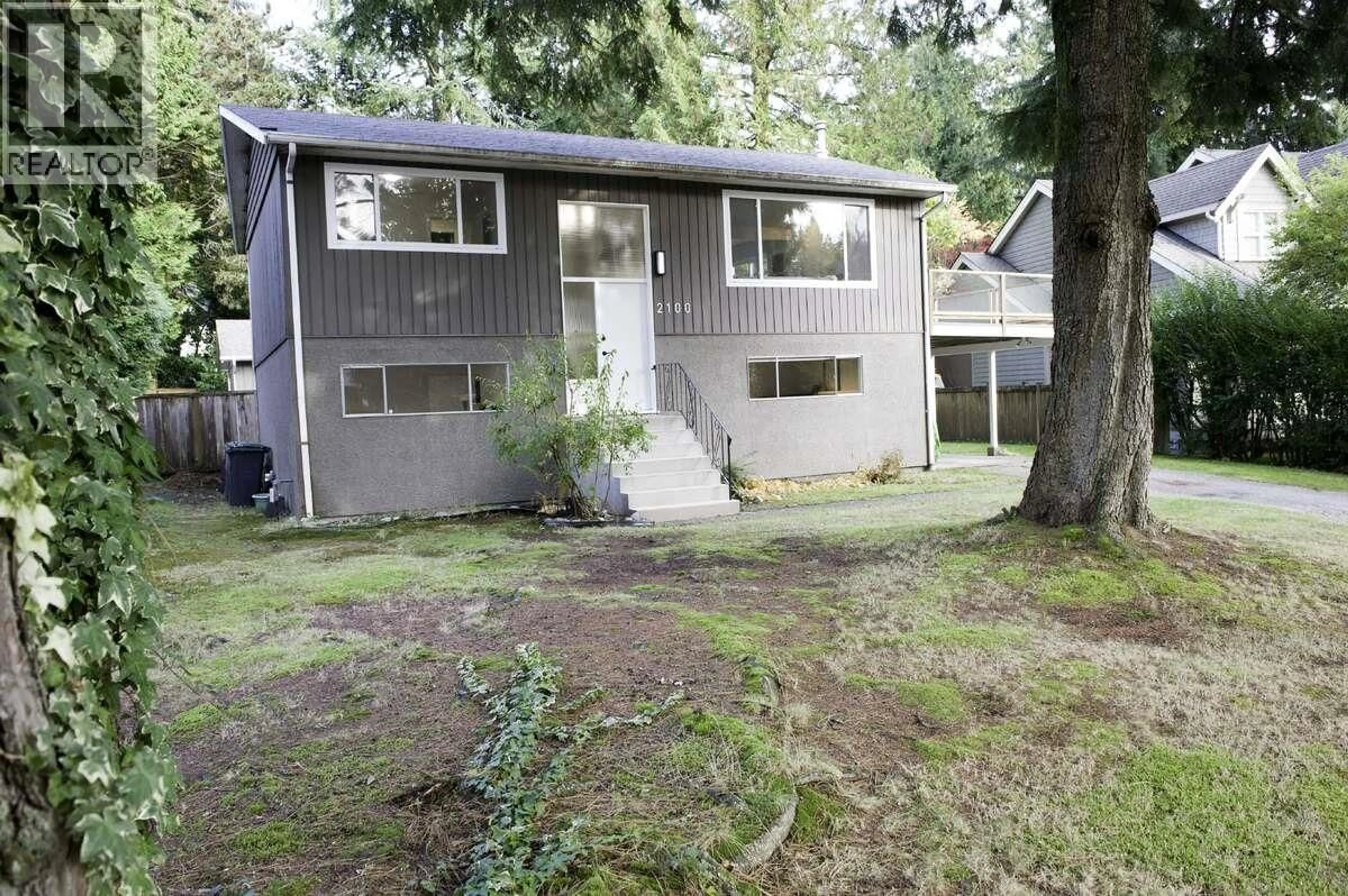 Home with vinyl exterior material, street for 2100 WHITMAN AVENUE, North Vancouver British Columbia V7H2C5