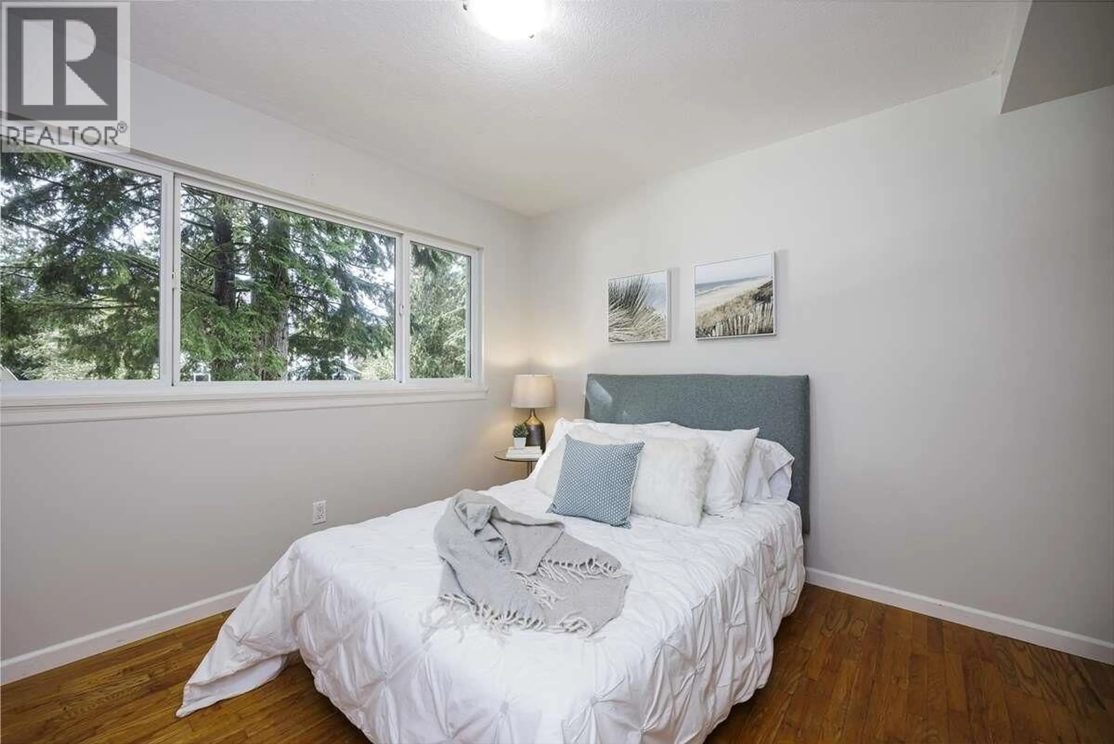 Bedroom with bed, wood/laminate floor for 2100 WHITMAN AVENUE, North Vancouver British Columbia V7H2C5