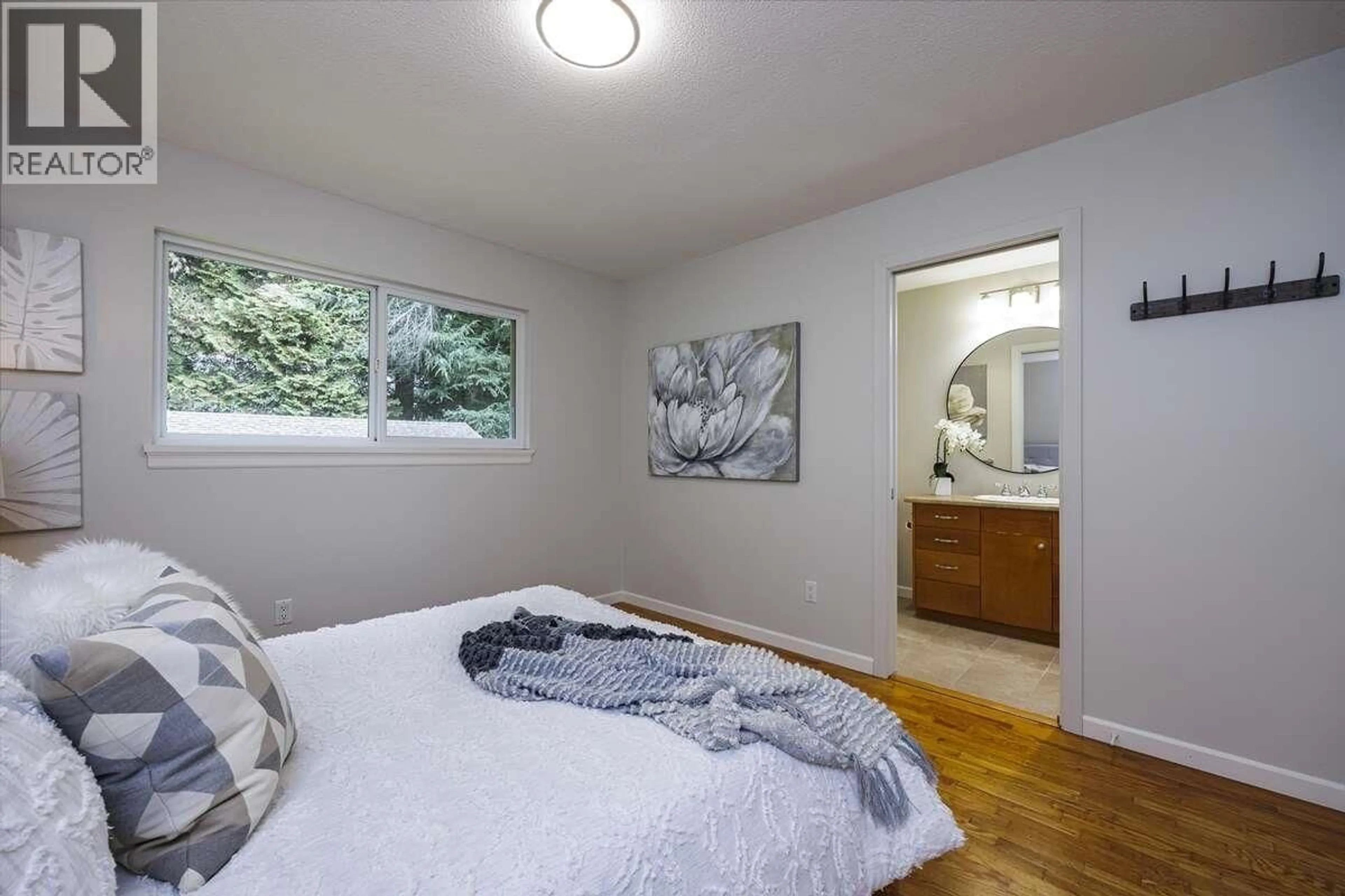 Bedroom with bed, wood/laminate floor for 2100 WHITMAN AVENUE, North Vancouver British Columbia V7H2C5