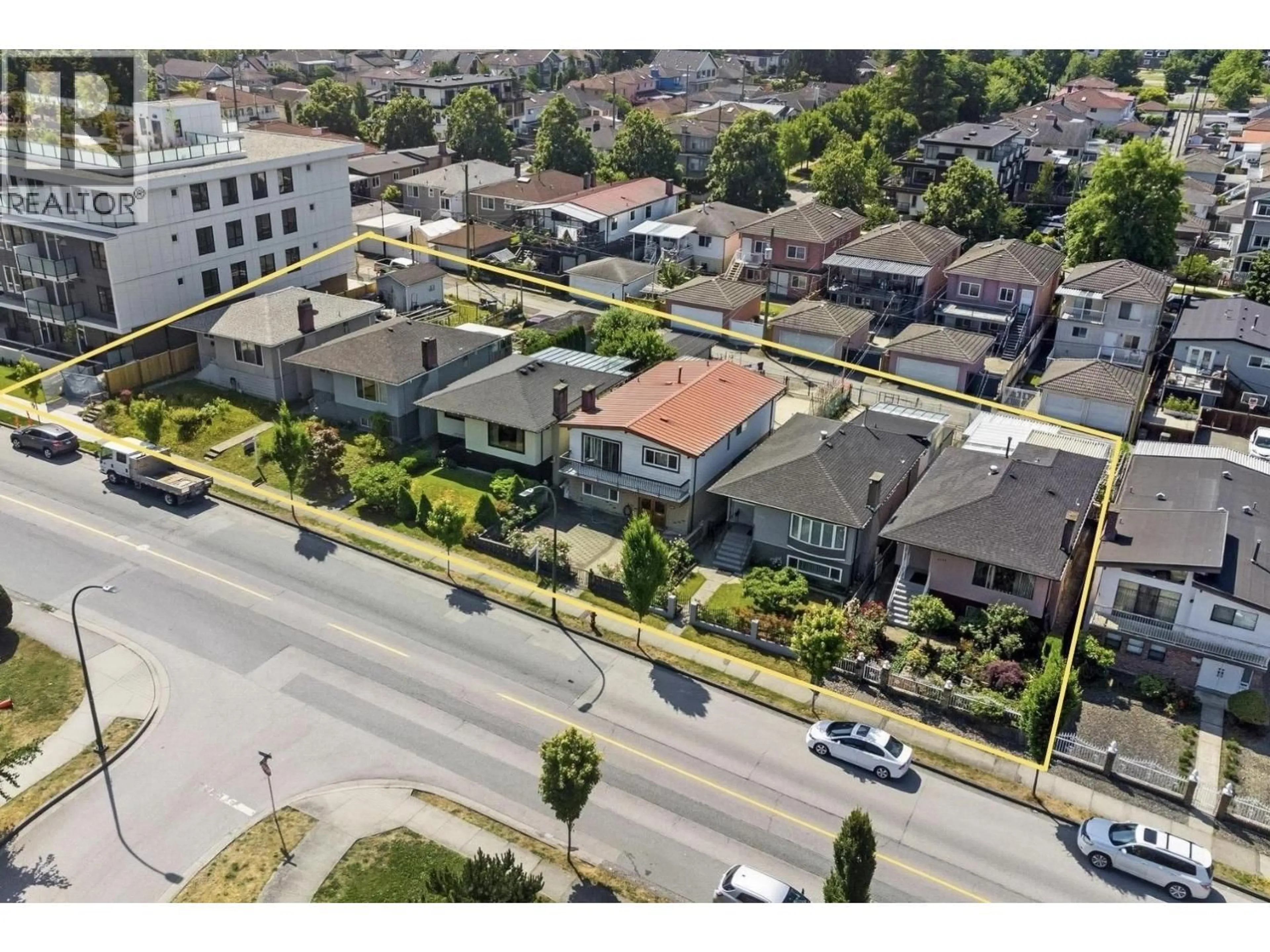 A pic from outside/outdoor area/front of a property/back of a property/a pic from drone, street for 2366 33RD AVENUE, Vancouver British Columbia V5R2S3