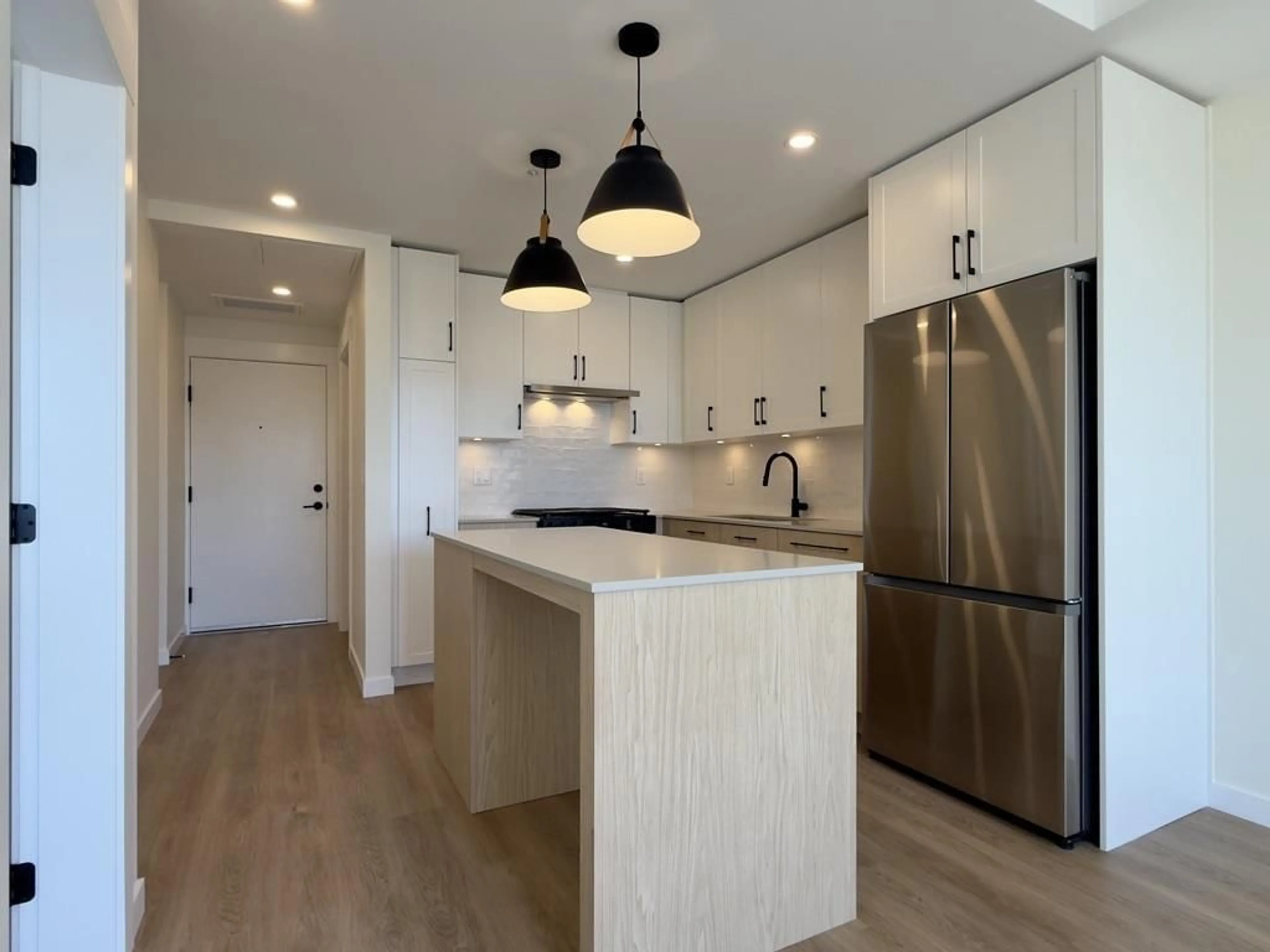 Open concept kitchen, unknown for 314 - 27218 ALDERGROVE TOWN CENTRE, Langley British Columbia V4W0E4