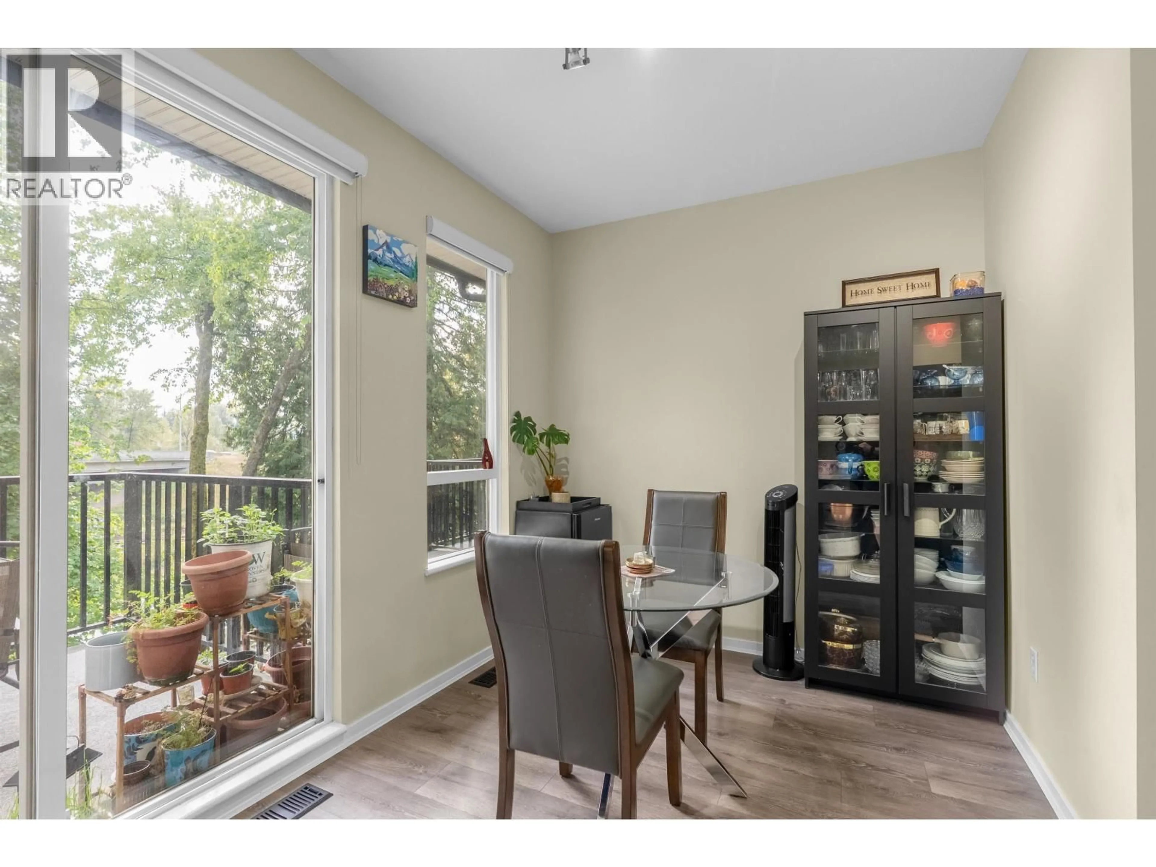 Dining room, wood/laminate floor for 167 - 9133 GOVERNMENT STREET, Burnaby British Columbia V3N0B1