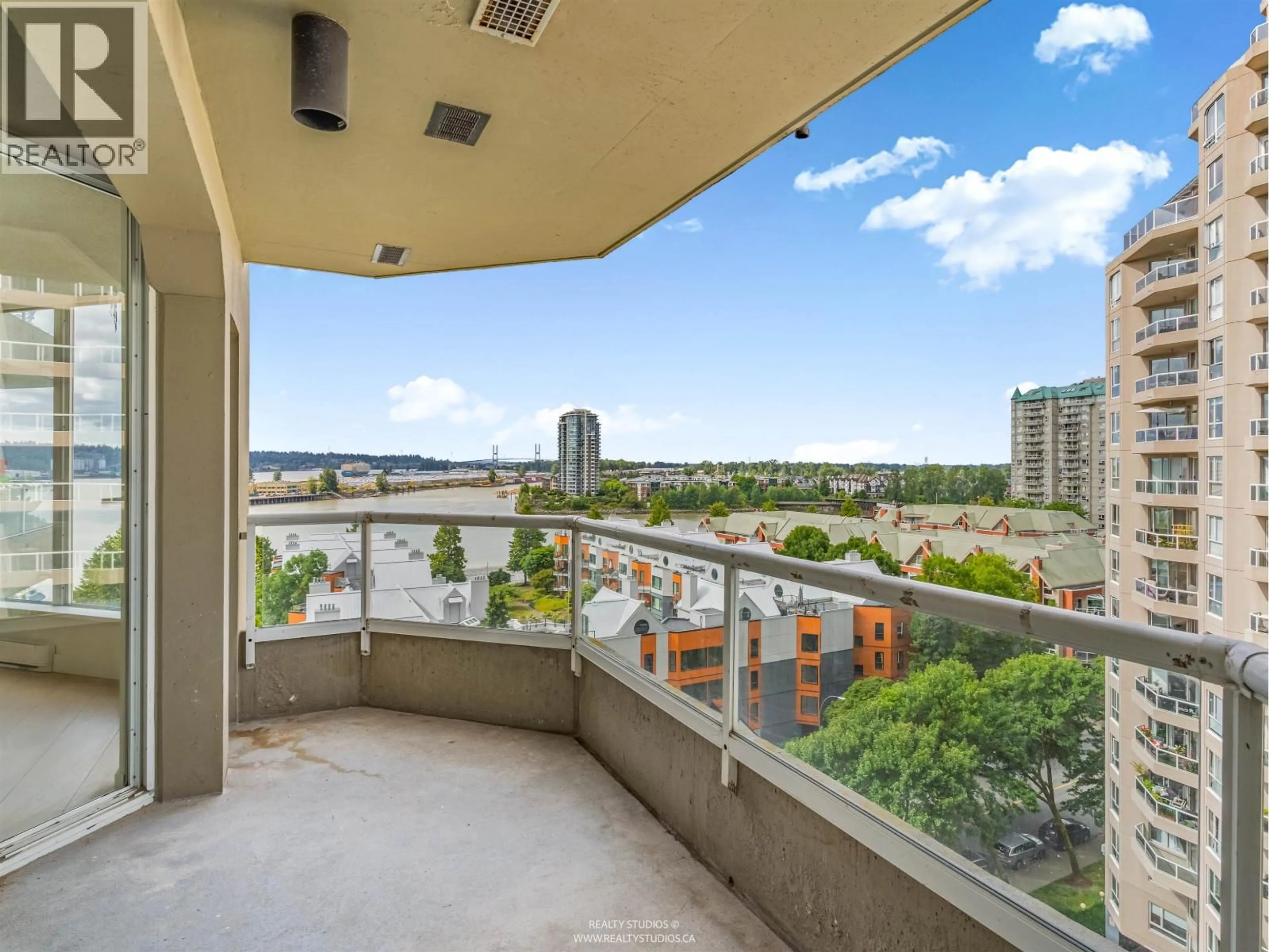 Balcony in the apartment, city buildings view from balcony for 1003 - 1135 QUAYSIDE DRIVE, New Westminster British Columbia V3M6J4