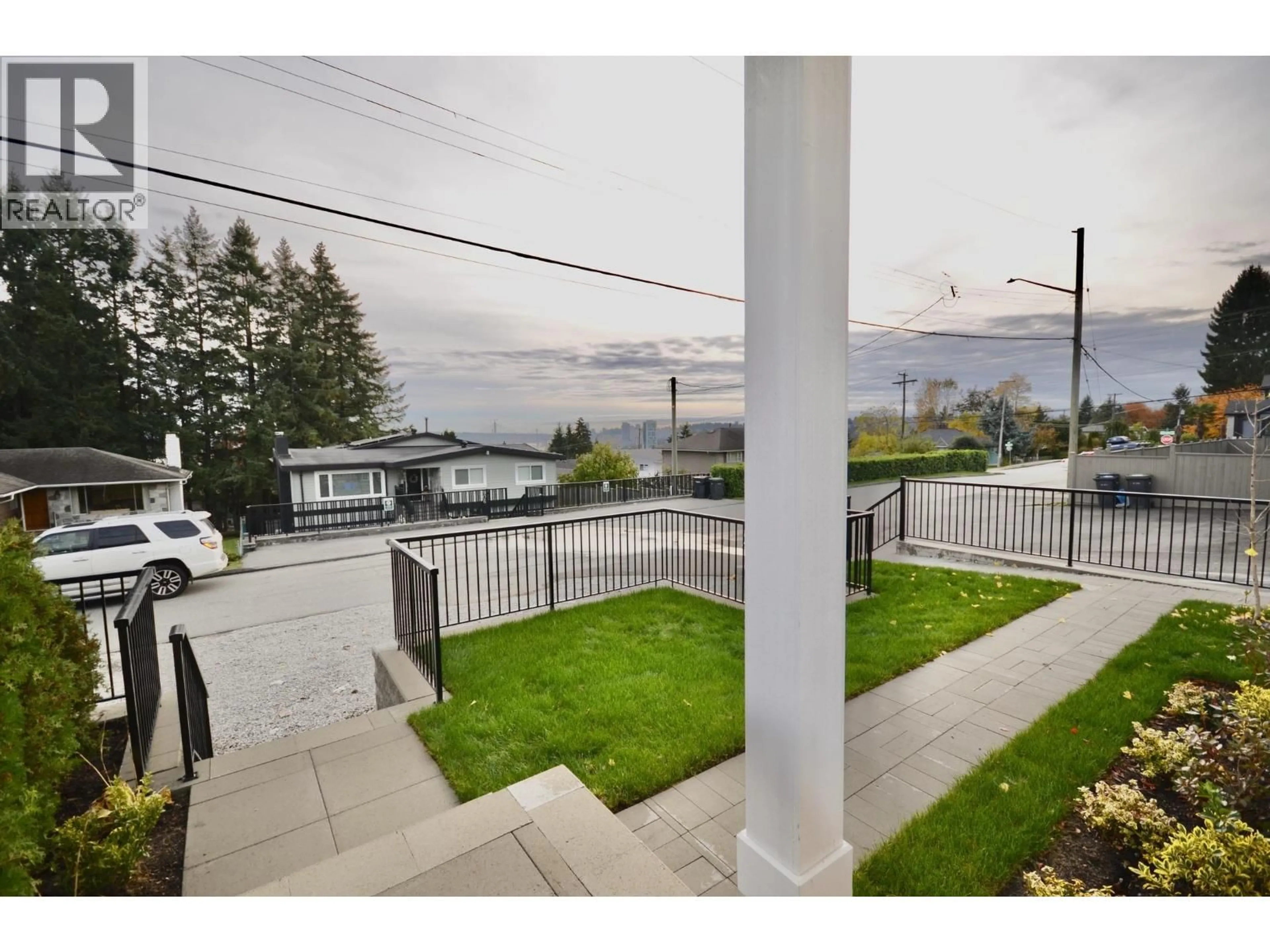 A pic from outside/outdoor area/front of a property/back of a property/a pic from drone, mountain view for 101 - 901 EDGAR AVENUE, Coquitlam British Columbia V3K2K1