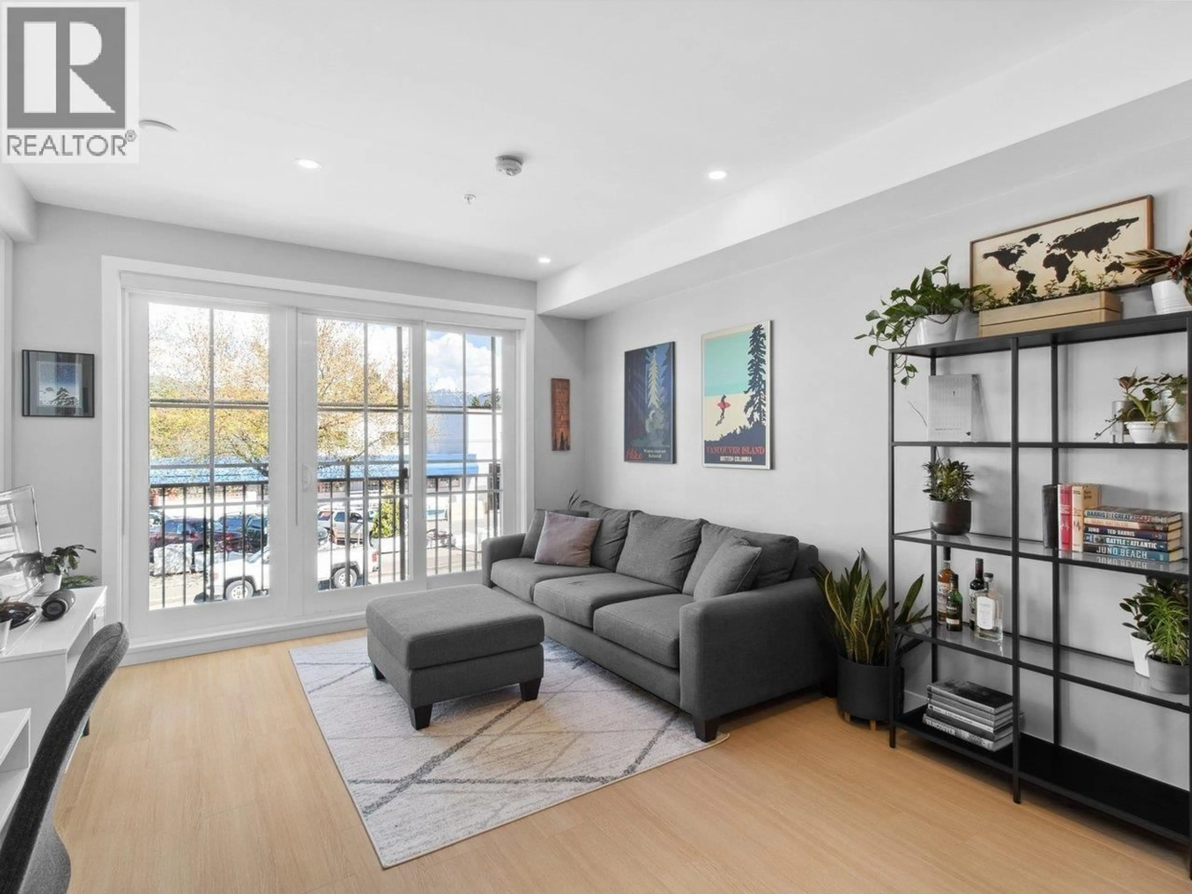 Living room with furniture, wood/laminate floor for 208 - 2528 COLLINGWOOD STREET, Vancouver British Columbia V6R0C1