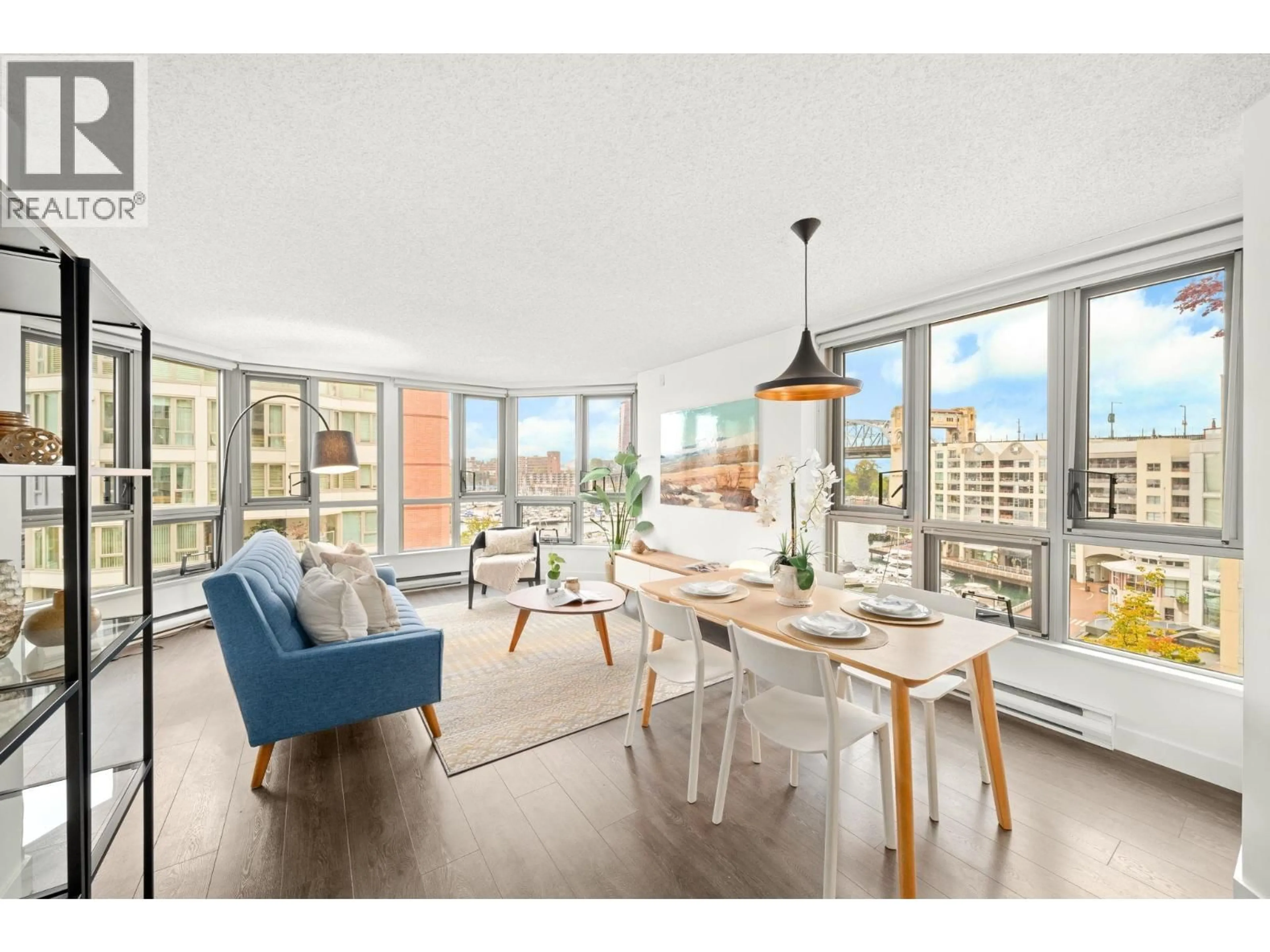 Living room with furniture, wood/laminate floor for 603 - 1625 HORNBY STREET, Vancouver British Columbia V6Z2M2