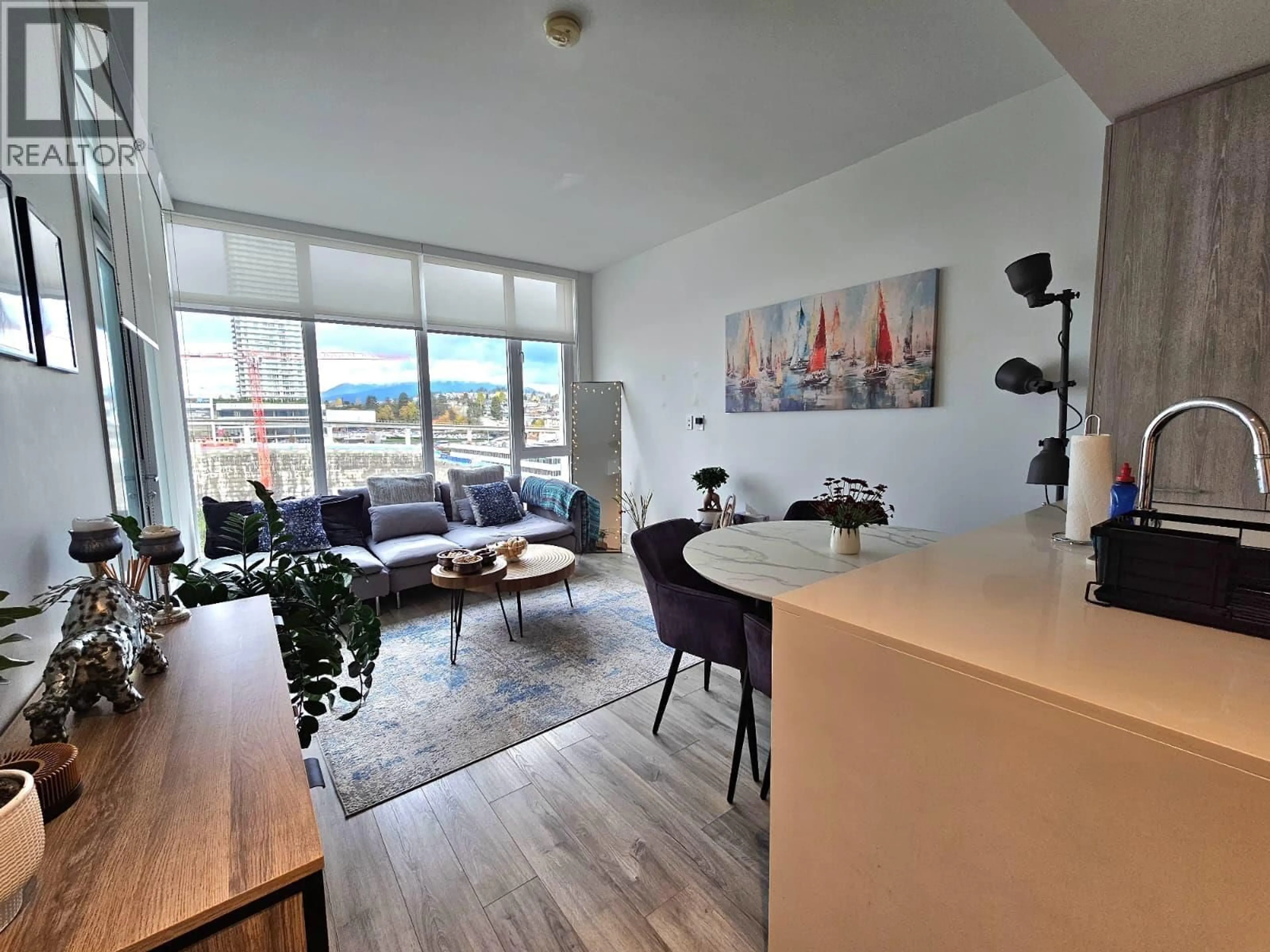 Living room with furniture, wood/laminate floor for 1006 - 2288 ALPHA AVENUE, Burnaby British Columbia V5C0L9