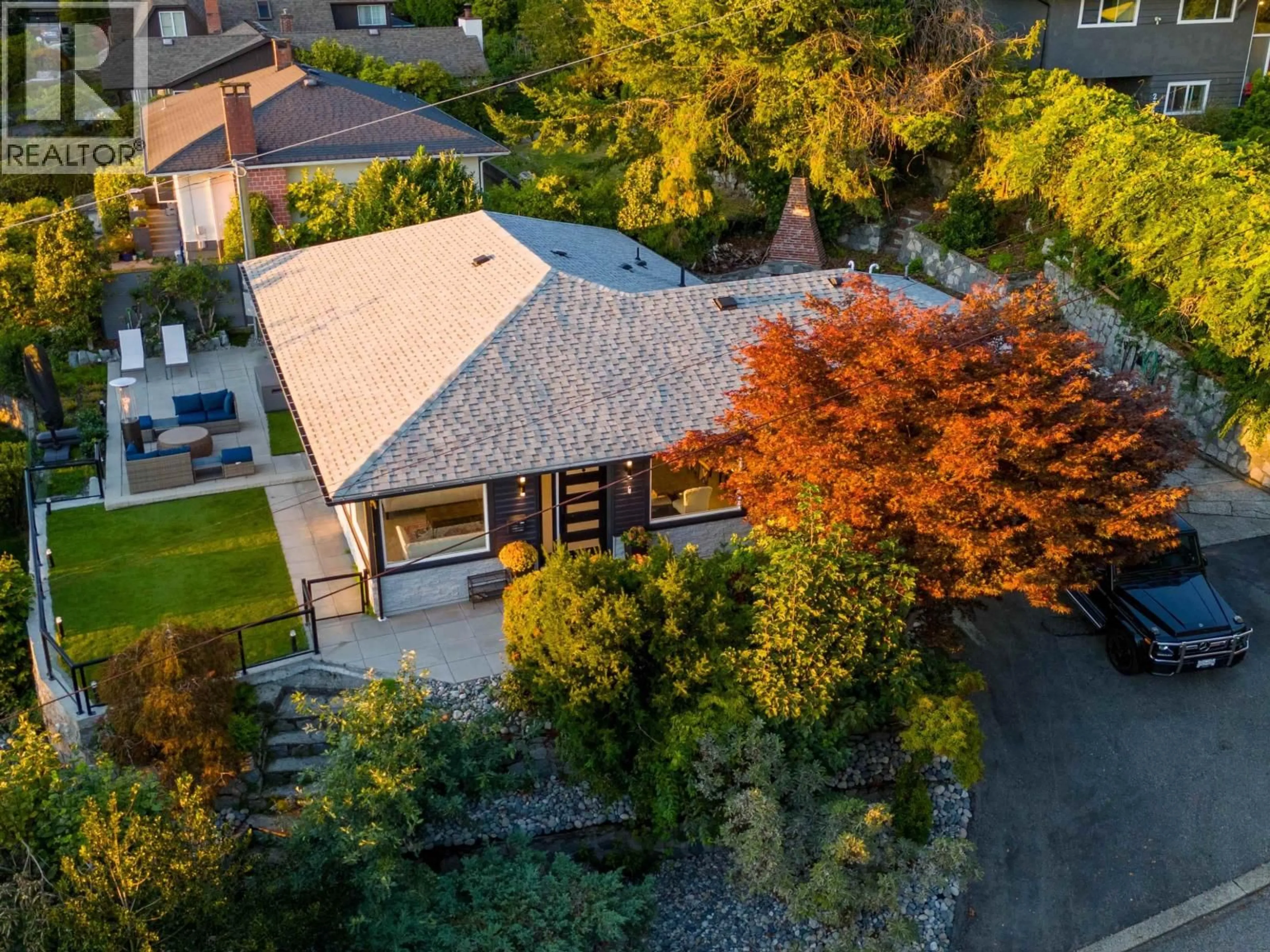 A pic from outside/outdoor area/front of a property/back of a property/a pic from drone, street for 3812 DALKEITH DRIVE, North Vancouver British Columbia V7N3N6
